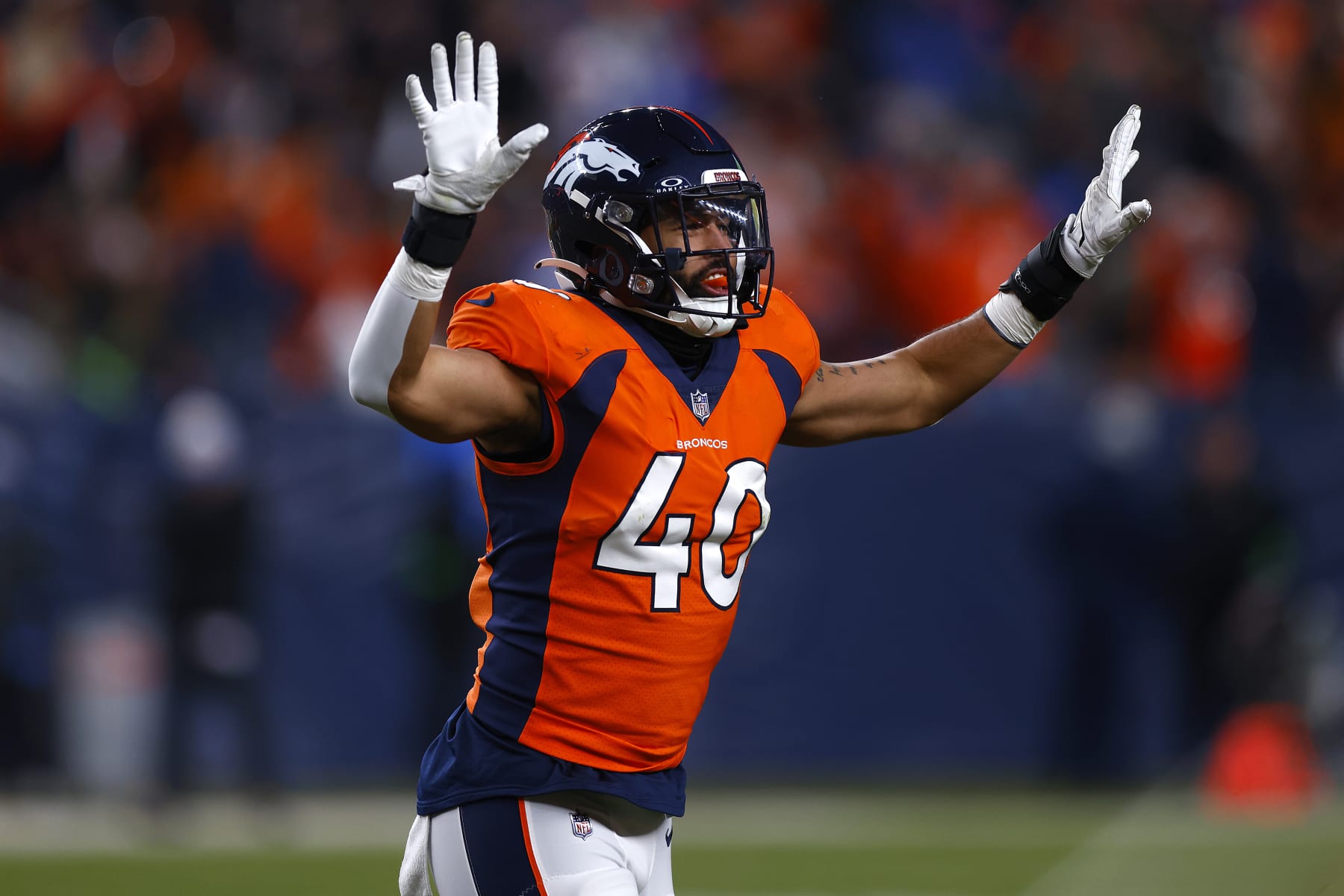 DENVER, COLORADO - DECEMBER 31: Justin Strnad #40 of the Denver Broncos celebrates after missed field goal by the Los Angeles Chargers during the fourth quarter at Empower Field At Mile High on December 31, 2023 in Denver, Colorado. (Photo by Justin Edmonds/Getty Images) DENVER, COLORADO - DECEMBER 31: Justin Strnad #40 of the Denver Broncos celebrates after missed field goal by the Los Angeles Chargers during the fourth quarter at Empower Field At Mile High on December 31, 2023 in Denver, Colorado. (Photo by Justin Edmonds/Getty Images)