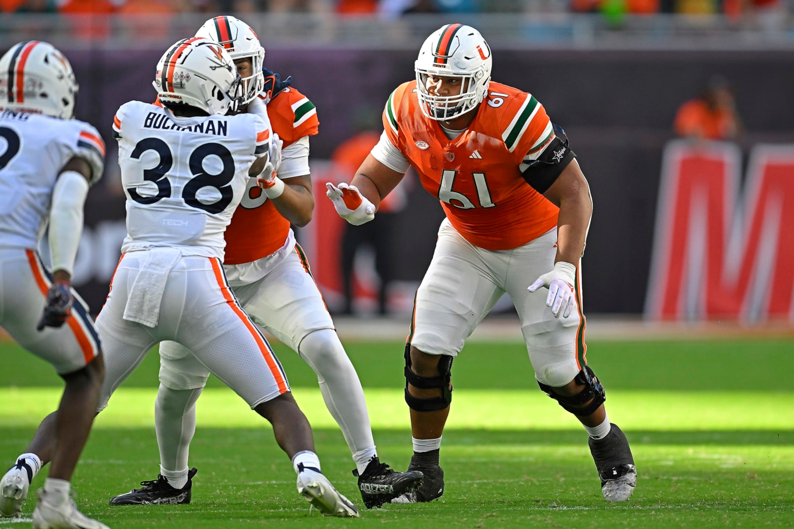 MIAMI GARDENS, FL - OCTOBER 28: Miami offensive lineman Francis Mauigoa (61) defends the line in the third quarter as the Miami Hurricanes faced the Virginia Cavaliers on October 28, 2023, at Hard Rock Stadium in Miami Gardens, Florida. (Photo by Samuel Lewis/Icon Sportswire via Getty Images) MIAMI GARDENS, FL - OCTOBER 28: Miami offensive lineman Francis Mauigoa (61) defends the line in the third quarter as the Miami Hurricanes faced the Virginia Cavaliers on October 28, 2023, at Hard Rock Stadium in Miami Gardens, Florida. (Photo by Samuel Lewis/Icon Sportswire via Getty Images)