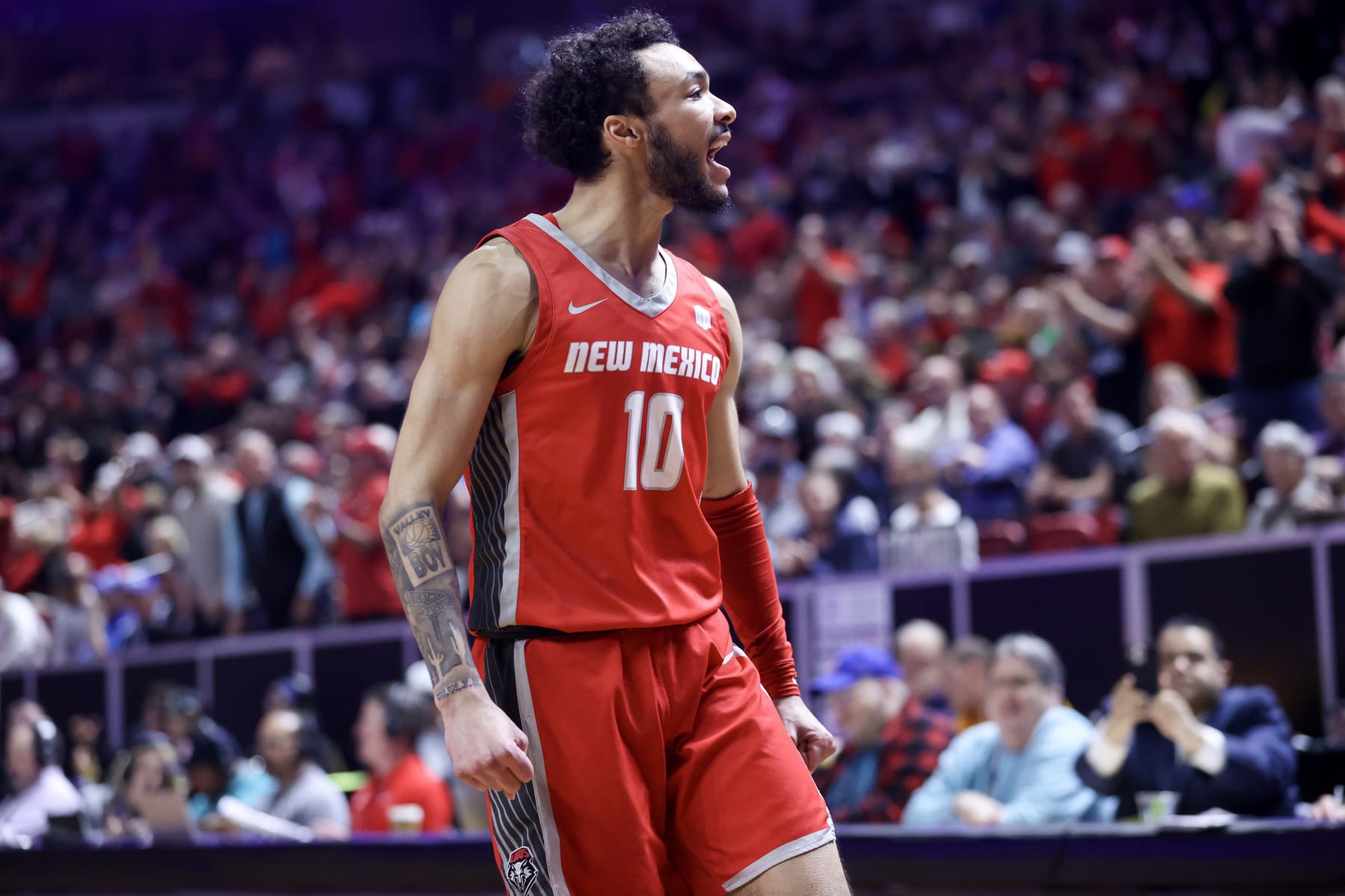 LAS VEGAS, NEVADA - MARCH 16: Jaelen House #10 of the New Mexico Lobos yells after making a three point basket against the San Diego State Aztecs during the first half of the championship game of the Mountain West basketball tournament at the Thomas & Mack Center on March 16, 2024 in Las Vegas, Nevada. (Photo by Ian Maule/Getty Images)