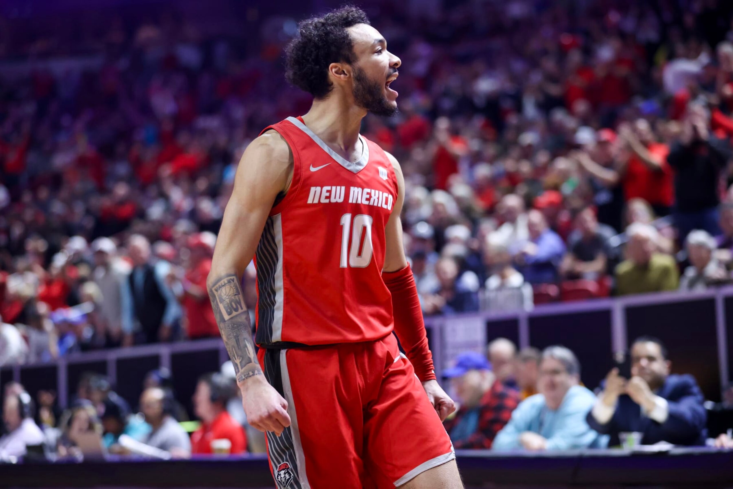 LAS VEGAS, NEVADA - MARCH 16: Jaelen House #10 of the New Mexico Lobos yells after making a three point basket against the San Diego State Aztecs during the first half of the championship game of the Mountain West basketball tournament at the Thomas & Mack Center on March 16, 2024 in Las Vegas, Nevada. (Photo by Ian Maule/Getty Images) LAS VEGAS, NEVADA - MARCH 16: Jaelen House #10 of the New Mexico Lobos yells after making a three point basket against the San Diego State Aztecs during the first half of the championship game of the Mountain West basketball tournament at the Thomas & Mack Center on March 16, 2024 in Las Vegas, Nevada. (Photo by Ian Maule/Getty Images)