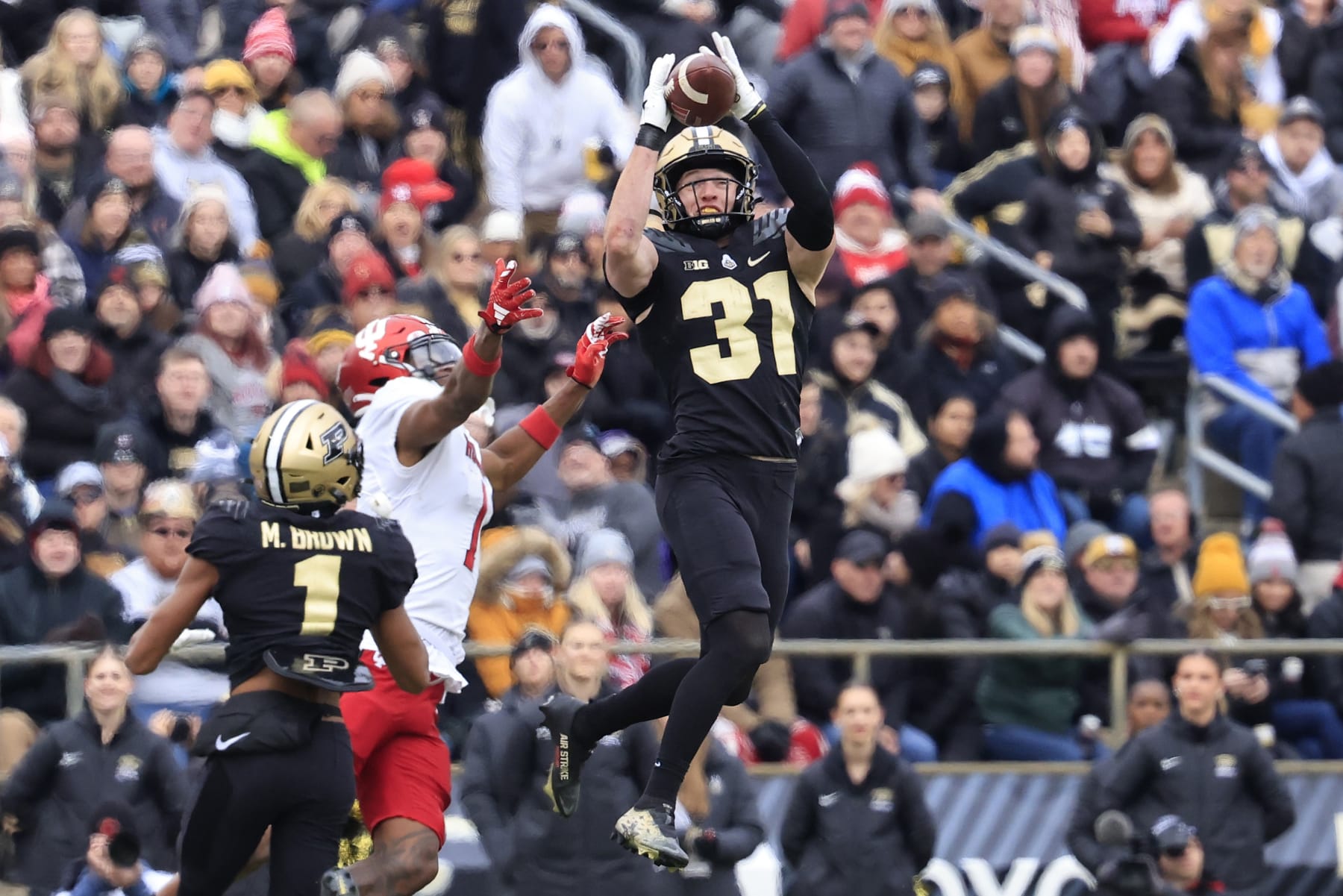 WEST LAFAYETTE, INDIANA - NOVEMBER 25: Dillon Thieneman #31 of the Purdue Boilermakers intercepts a pass in the game against the Indiana Hoosiers during the first half at Ross-Ade Stadium on November 25, 2023 in West Lafayette, Indiana. (Photo by Justin Casterline/Getty Images)