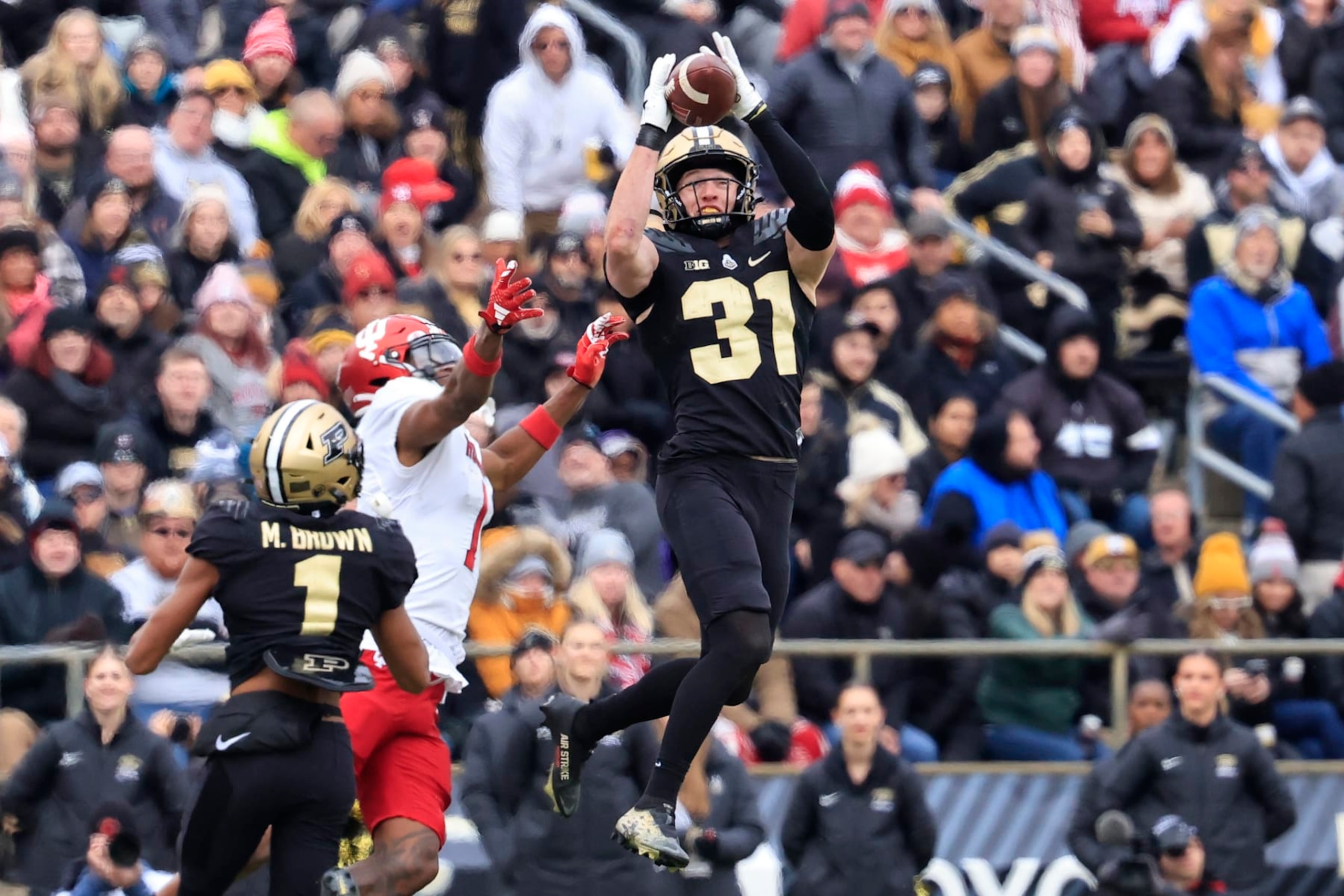 WEST LAFAYETTE, INDIANA - NOVEMBER 25: Dillon Thieneman #31 of the Purdue Boilermakers intercepts a pass in the game against the Indiana Hoosiers during the first half at Ross-Ade Stadium on November 25, 2023 in West Lafayette, Indiana. (Photo by Justin Casterline/Getty Images) WEST LAFAYETTE, INDIANA - NOVEMBER 25: Dillon Thieneman #31 of the Purdue Boilermakers intercepts a pass in the game against the Indiana Hoosiers during the first half at Ross-Ade Stadium on November 25, 2023 in West Lafayette, Indiana. (Photo by Justin Casterline/Getty Images)