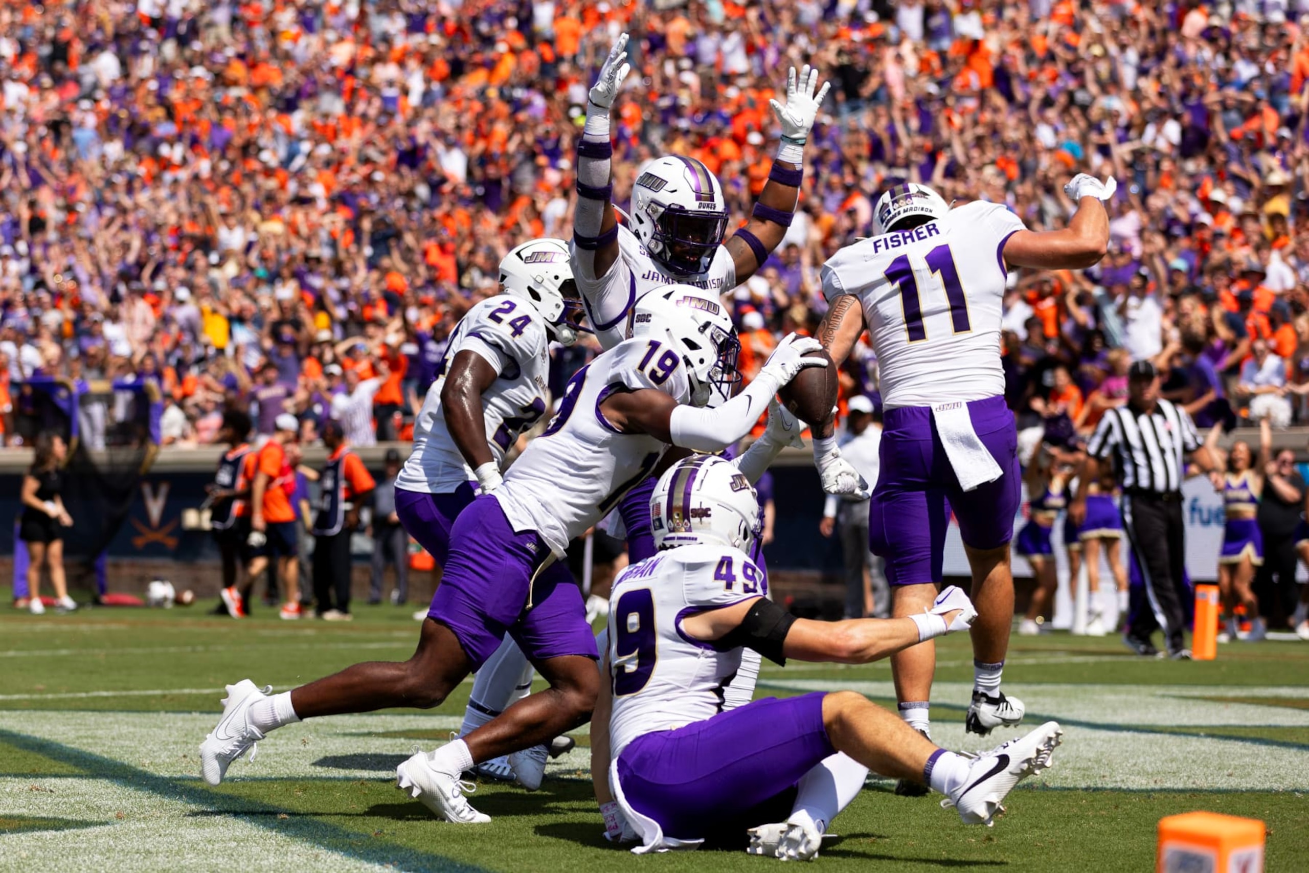 CHARLOTTESVILLE, VIRGINIA - SEPTEMBER 9: D'Angelo Ponds #19 of the James Madison Dukes celebrates recovering a blocked punt for a touchdown in the first half during a game against the Virginia Cavaliers at Scott Stadium on September 9, 2023 in Charlottesville, Virginia. (Photo by Ryan M. Kelly/Getty Images) CHARLOTTESVILLE, VIRGINIA - SEPTEMBER 9: D'Angelo Ponds #19 of the James Madison Dukes celebrates recovering a blocked punt for a touchdown in the first half during a game against the Virginia Cavaliers at Scott Stadium on September 9, 2023 in Charlottesville, Virginia. (Photo by Ryan M. Kelly/Getty Images)