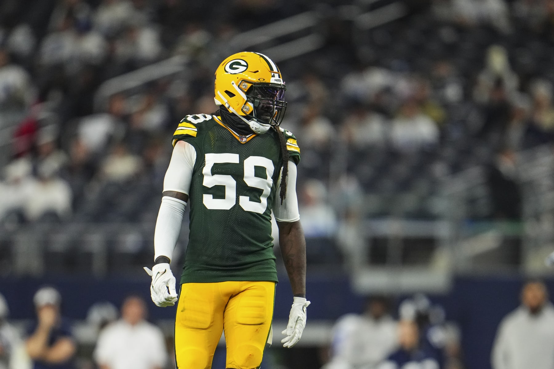 DALLAS, TX - JANUARY 14: De'Vondre Campbell #59 of the Green Bay Packers lines up during an NFL wild-card playoff football game against the Dallas Cowboys at AT&T Stadium on January 14, 2024 in Dallas, Texas. (Photo by Cooper Neill/Getty Images)