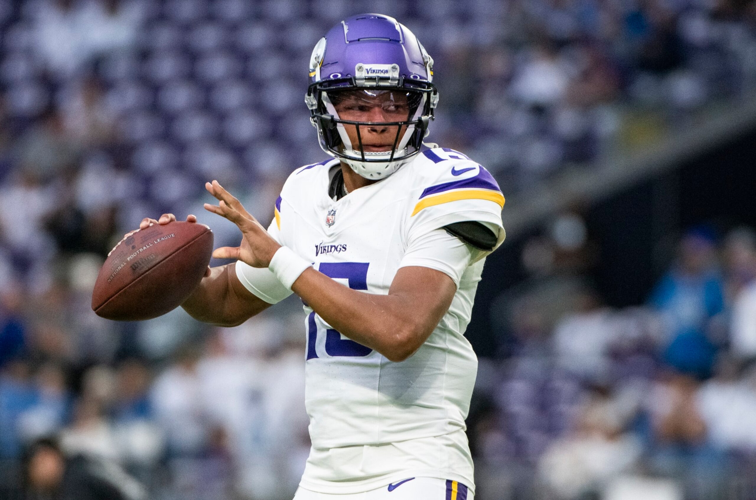 MINNEAPOLIS, MINNESOTA - DECEMBER 24: Joshua Dobbs #15 of the Minnesota Vikings warms up before the game against the Detroit Lions at U.S. Bank Stadium on December 24, 2023 in Minneapolis, Minnesota. (Photo by Stephen Maturen/Getty Images)
