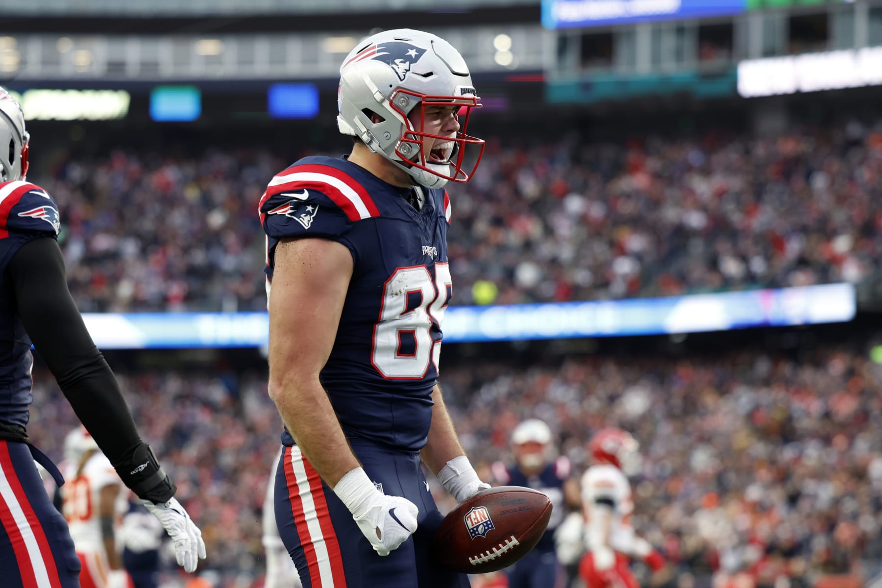 Foxborough, MA - December 17: New England Patriots TE Hunter Henry celebrates a first half touchdown. The Patriots lost to the Kansas City Chiefs, 27-17. (Photo by Danielle Parhizkaran/The Boston Globe via Getty Images)