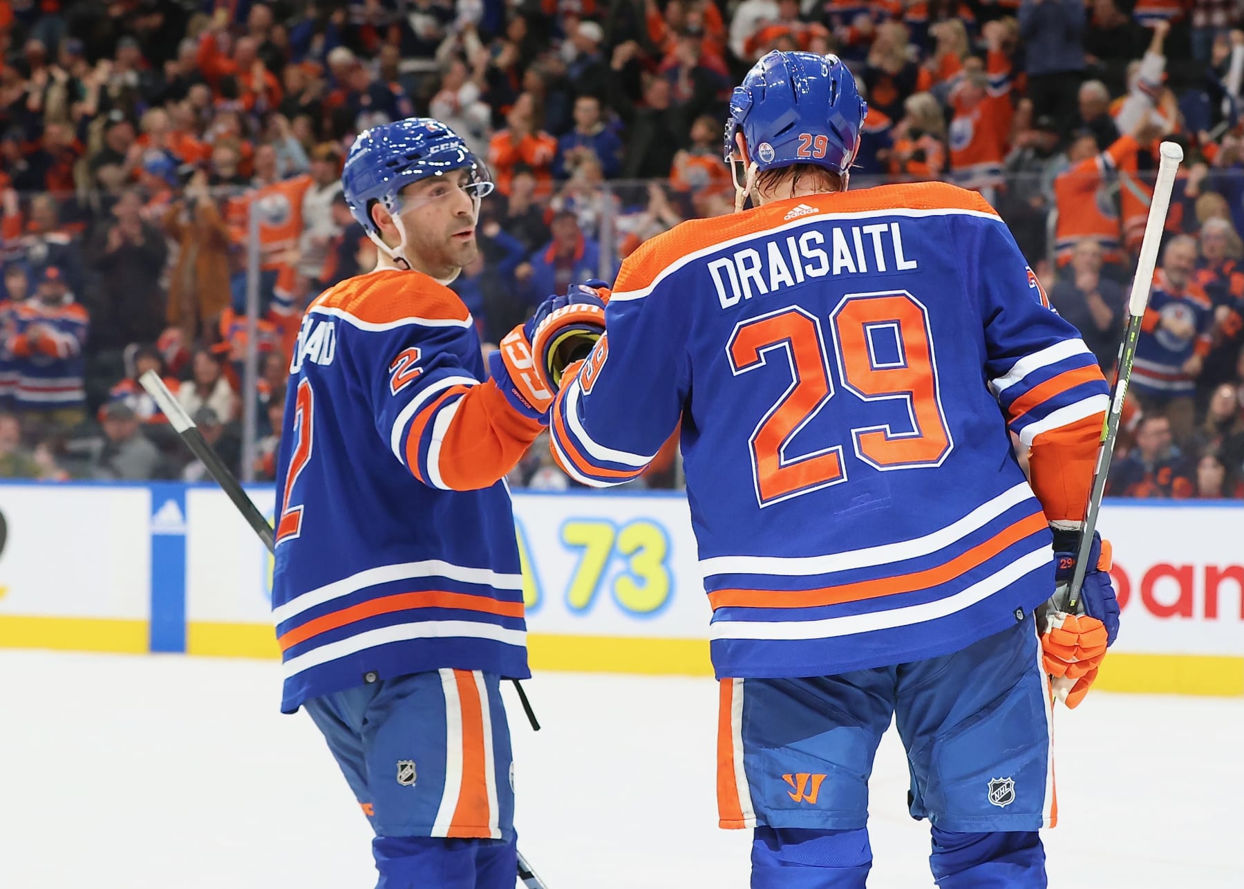 EDMONTON, CANADA - MARCH 19: Evan Bouchard #2 and Leon Draisaitl #29 of the Edmonton Oilers celebrate an overtime victory against the Montreal Canadiens on March 19, 2024 at Rogers Place in Edmonton, Alberta, Canada. (Photo by Lawrence Scott/Getty Images)