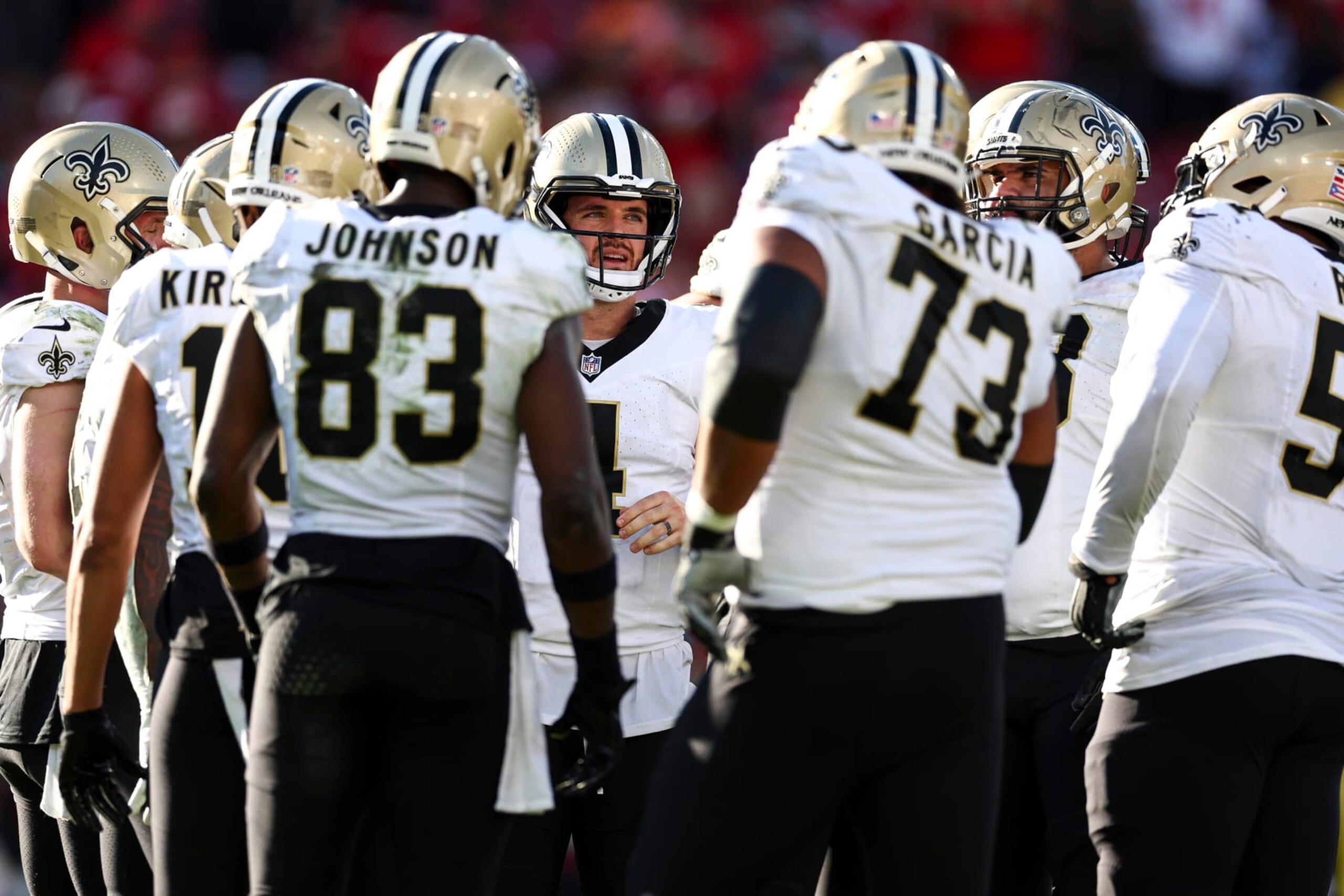 TAMPA, FL - DECEMBER 31: Derek Carr #4 of the New Orleans Saints huddles with the rest of the offense during the fourth quarter of an NFL football game against the Tampa Bay Buccaneers at Raymond James Stadium on December 31, 2023 in Tampa, Florida. (Photo by Kevin Sabitus/Getty Images) TAMPA, FL - DECEMBER 31: Derek Carr #4 of the New Orleans Saints huddles with the rest of the offense during the fourth quarter of an NFL football game against the Tampa Bay Buccaneers at Raymond James Stadium on December 31, 2023 in Tampa, Florida. (Photo by Kevin Sabitus/Getty Images)