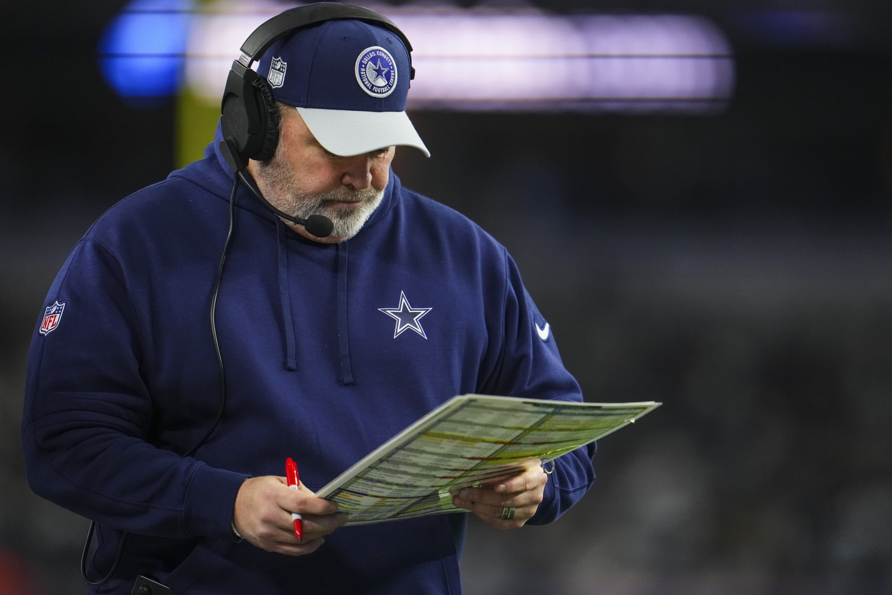 DALLAS, TX - JANUARY 14: Dallas Cowboys head coach Mike McCarthy looks on from the sideline during an NFL wild-card playoff football game against the Green Bay Packers at AT&T Stadium on January 14, 2024 in Dallas, Texas. (Photo by Cooper Neill/Getty Images)