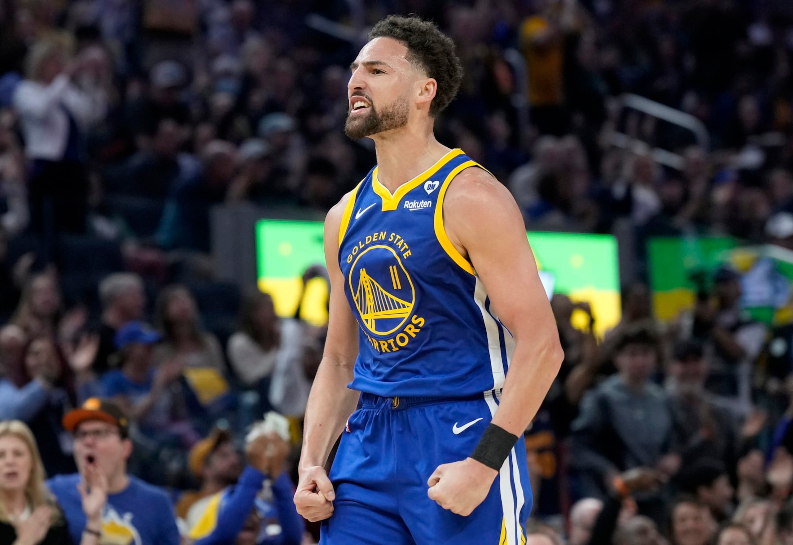SAN FRANCISCO, CALIFORNIA - FEBRUARY 25: Klay Thompson #11 of the Golden State Warriors reacts after making a three-point shot against the Denver Nuggets in the second quarter at Chase Center on February 25, 2024 in San Francisco, California. NOTE TO USER: User expressly acknowledges and agrees that, by downloading and or using this photograph, User is consenting to the terms and conditions of the Getty Images License Agreement. (Photo by Thearon W. Henderson/Getty Images)