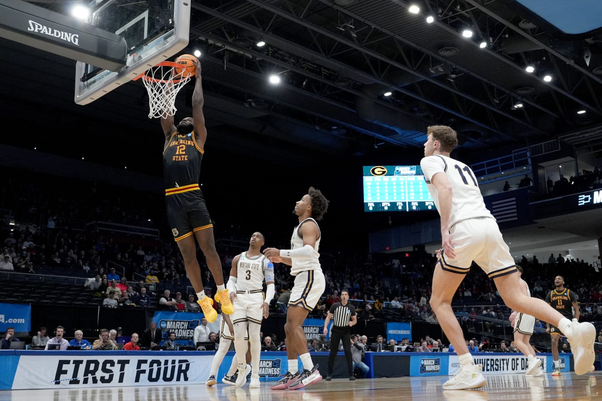 DAYTON, OHIO - MARCH 20: Jonathan Aku #12 of the Grambling State Tigers dunks the ball against the Montana State Bobcats during the first half in the First Four game of the NCAA Men's Basketball Tournament at University of Dayton Arena on March 20, 2024 in Dayton, Ohio. (Photo by Dylan Buell/Getty Images)