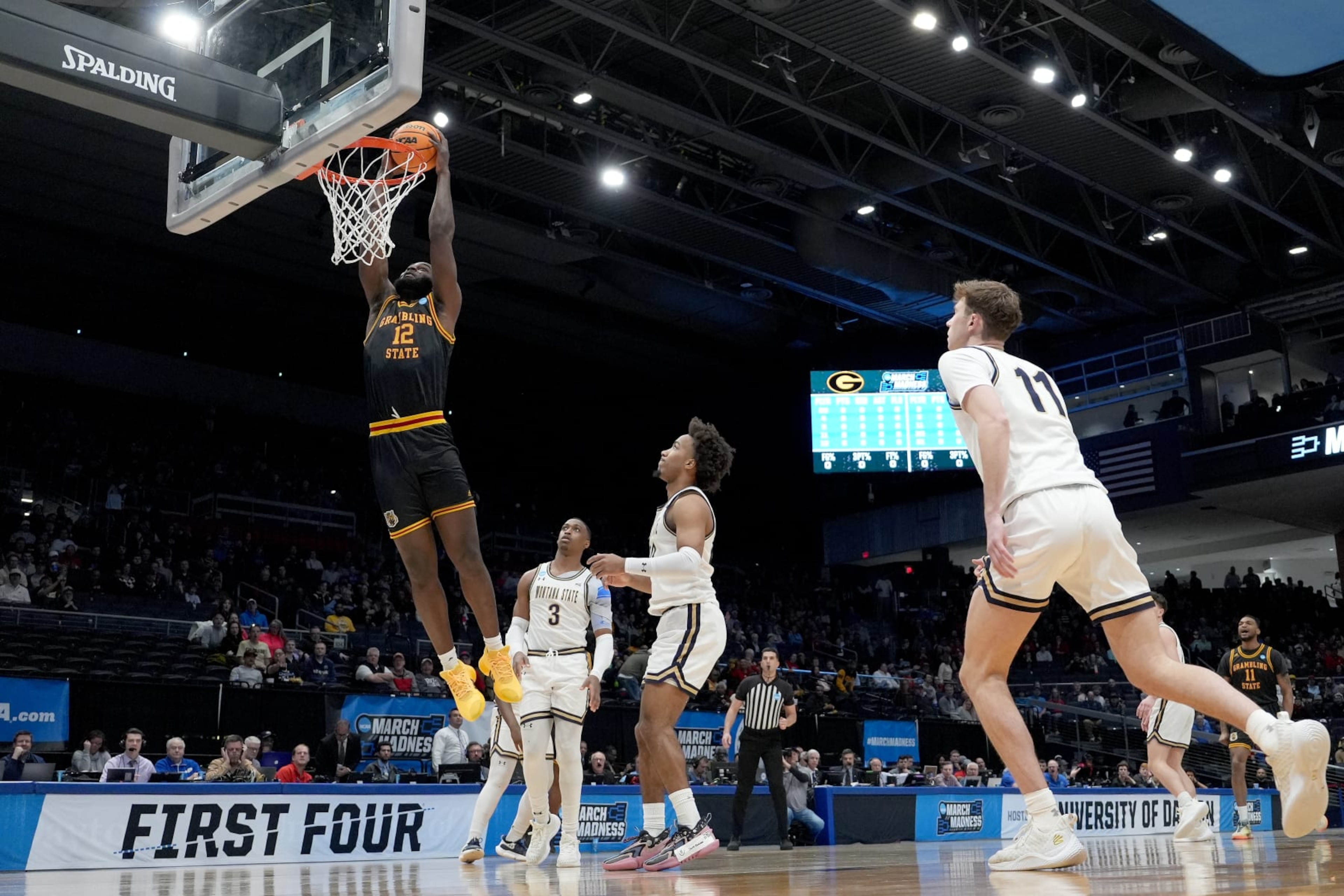 DAYTON, OHIO - MARCH 20: Jonathan Aku #12 of the Grambling State Tigers dunks the ball against the Montana State Bobcats during the first half in the First Four game of the NCAA Men's Basketball Tournament at University of Dayton Arena on March 20, 2024 in Dayton, Ohio. (Photo by Dylan Buell/Getty Images)