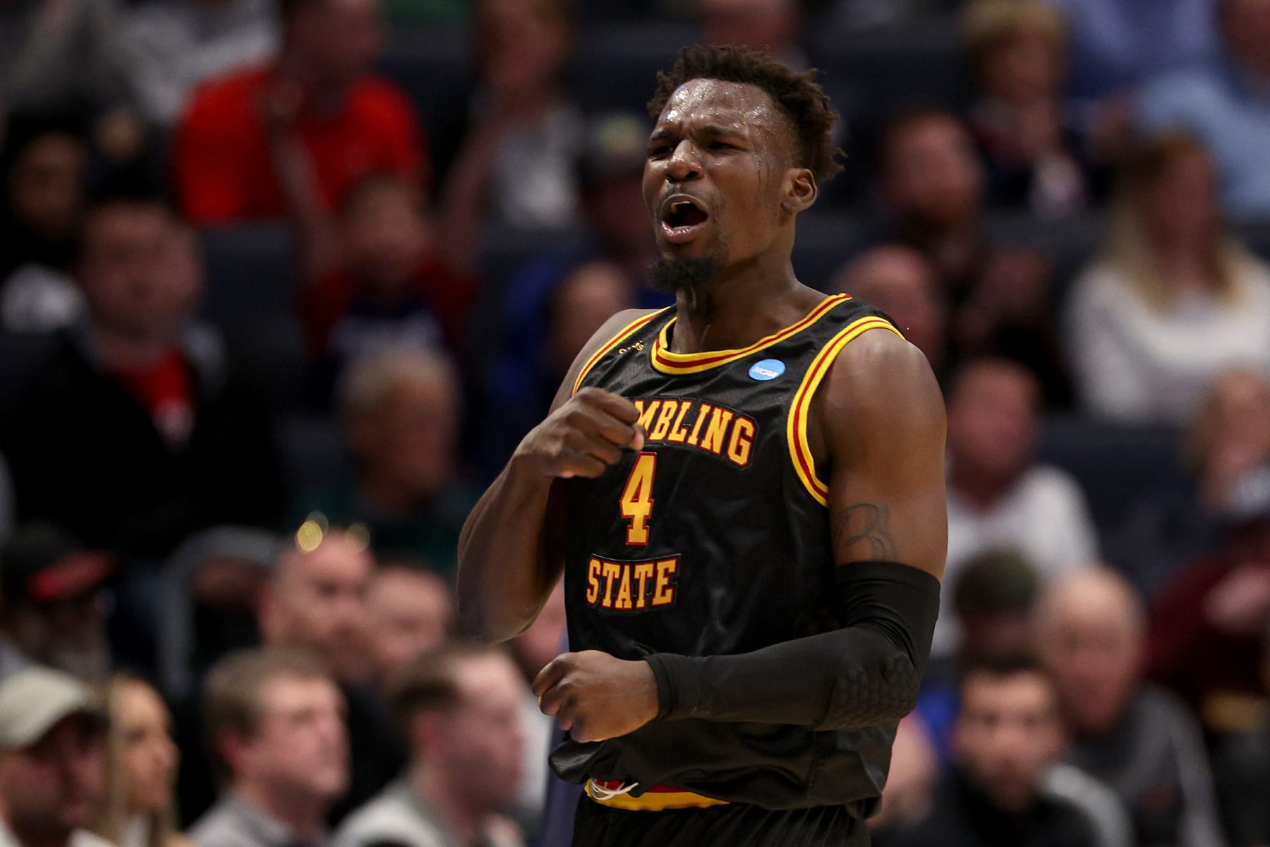 DAYTON, OHIO - MARCH 20: Antwan Burnett #4 of the Grambling State Tigers celebrates a basket against the Montana State Bobcats during the first half in the First Four game of the NCAA Men's Basketball Tournament at University of Dayton Arena on March 20, 2024 in Dayton, Ohio. (Photo by Michael Hickey/Getty Images)