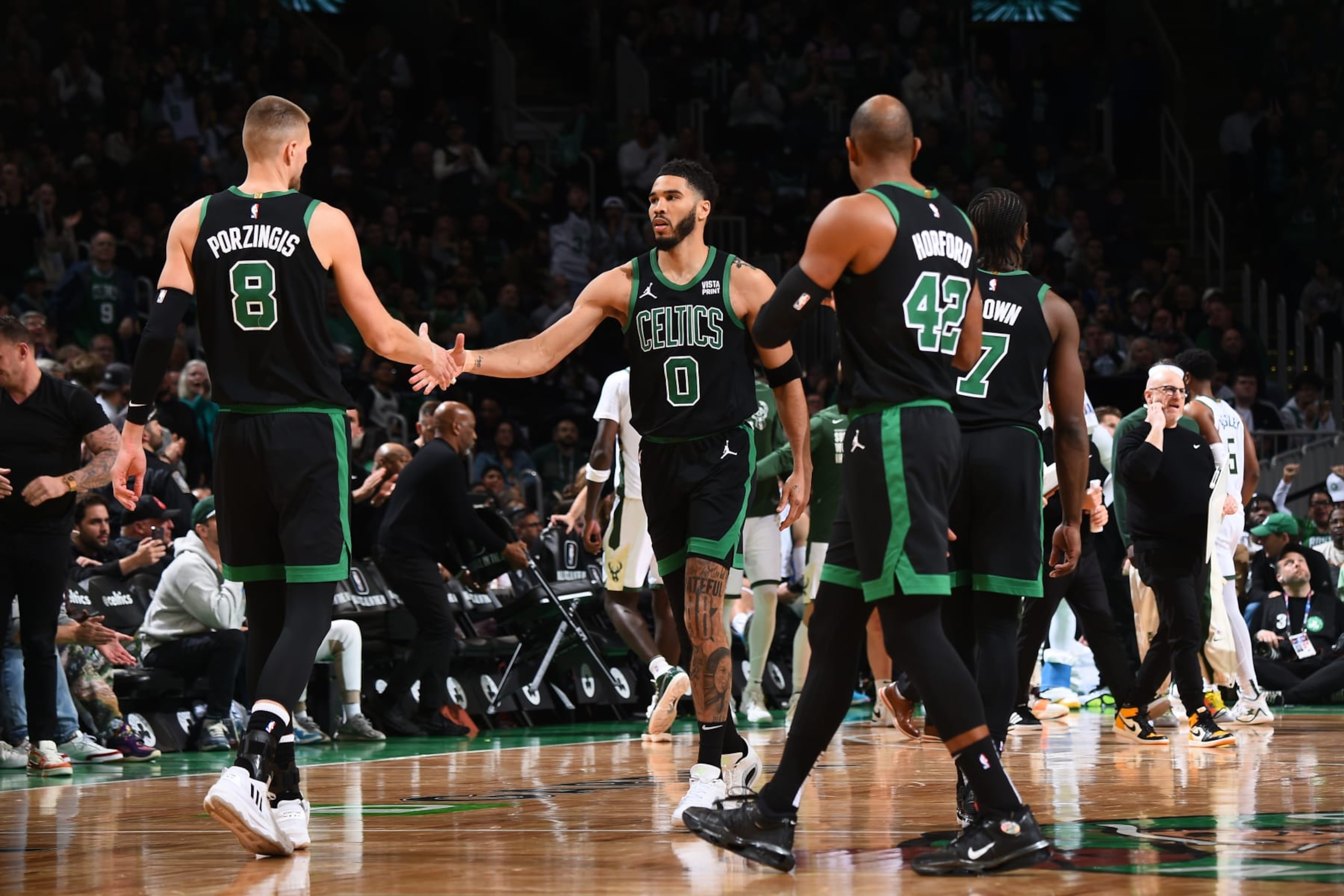 Kristaps PorziÅÄ£is, Jayson Tatum, Al Horford and Jaylen Brown Kristaps PorziÅÄ£is, Jayson Tatum, Al Horford and Jaylen Brown