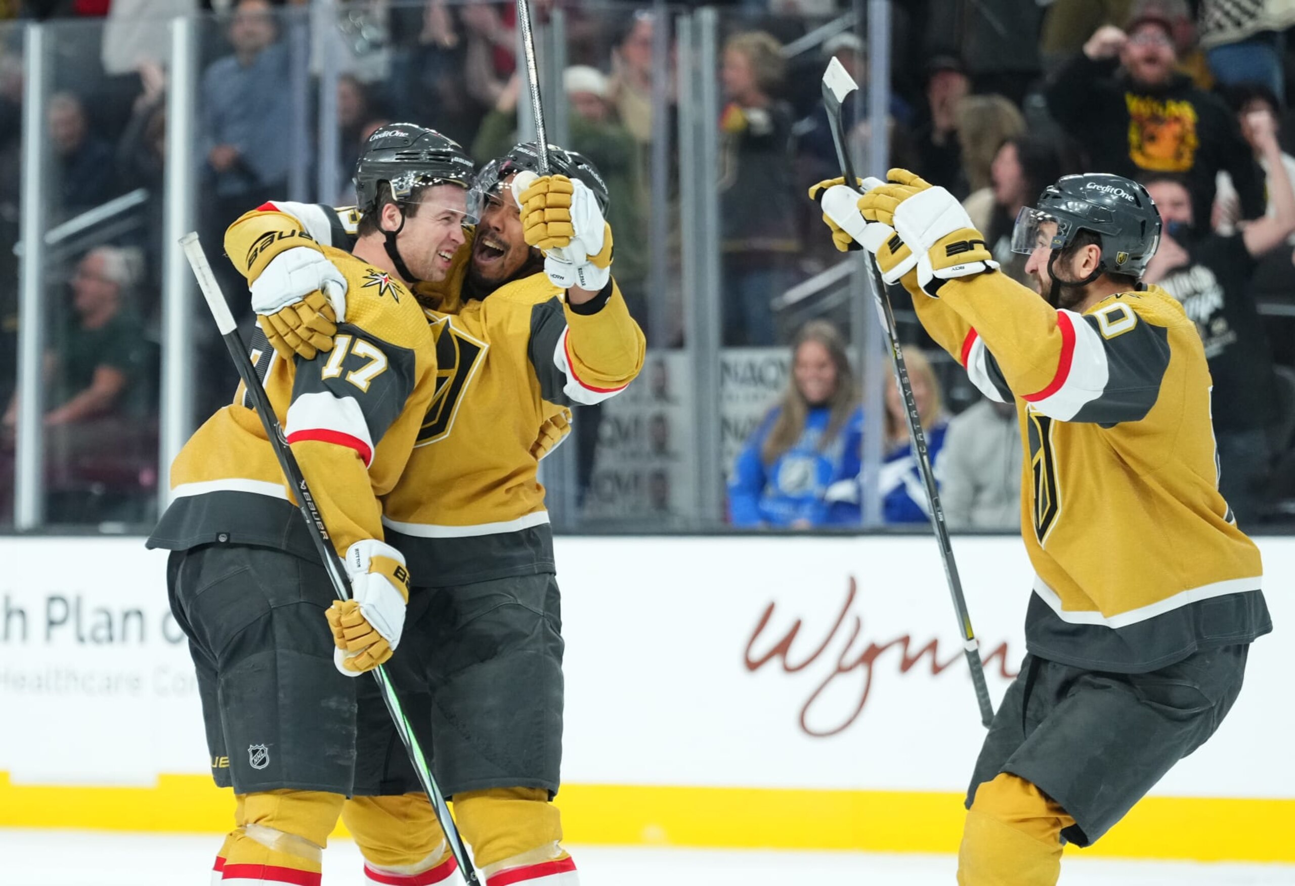 LAS VEGAS, NEVADA - MARCH 19: Ben Hutton #17 of the Vegas Golden Knights celebrates with teammates after a goal during the third period against the Tampa Bay Lightning at T-Mobile Arena on March 19, 2024 in Las Vegas, Nevada. (Photo by Jeff Bottari/NHLI via Getty Images)