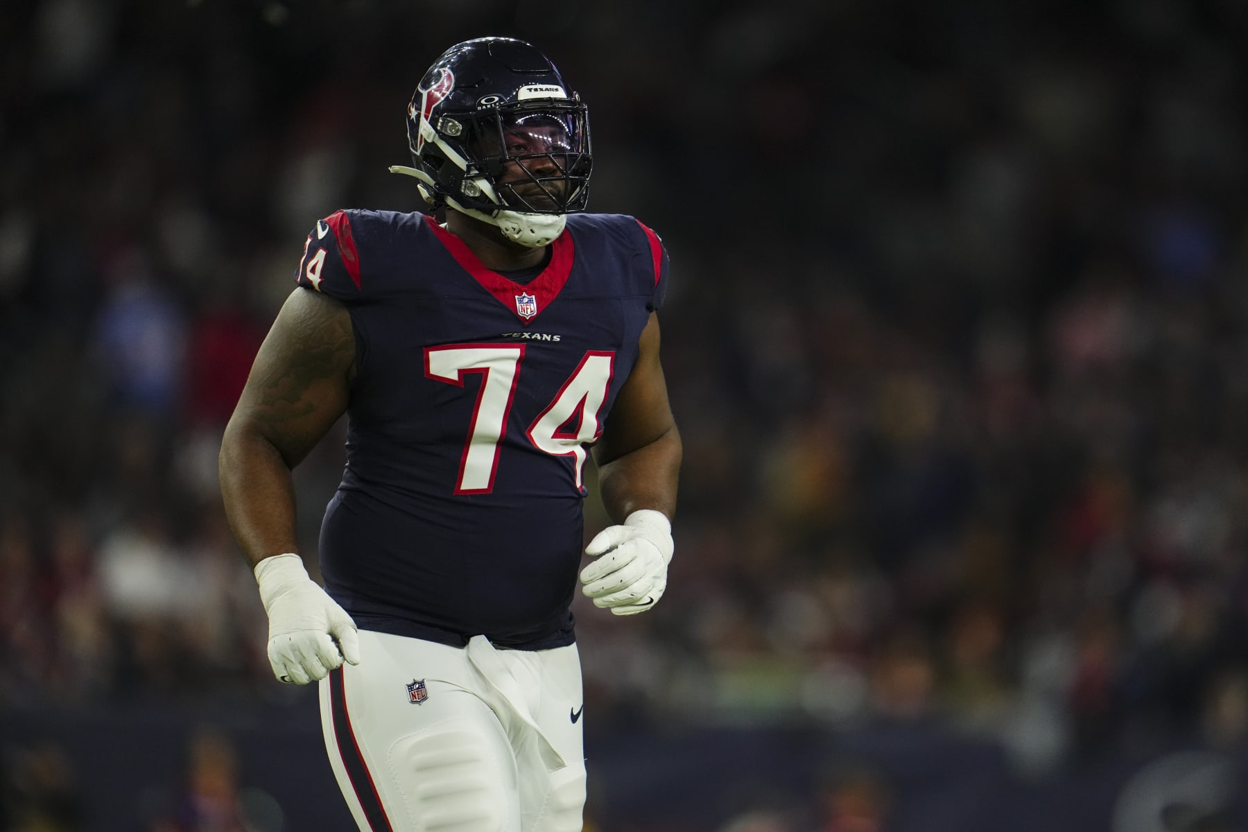 HOUSTON, TX - JANUARY 13: Josh Jones #74 of the Houston Texans runs across the field during an NFL wild-card playoff football game against the Cleveland Browns at NRG Stadium on January 13, 2024 in Houston, Texas. (Photo by Cooper Neill/Getty Images) HOUSTON, TX - JANUARY 13: Josh Jones #74 of the Houston Texans runs across the field during an NFL wild-card playoff football game against the Cleveland Browns at NRG Stadium on January 13, 2024 in Houston, Texas. (Photo by Cooper Neill/Getty Images)