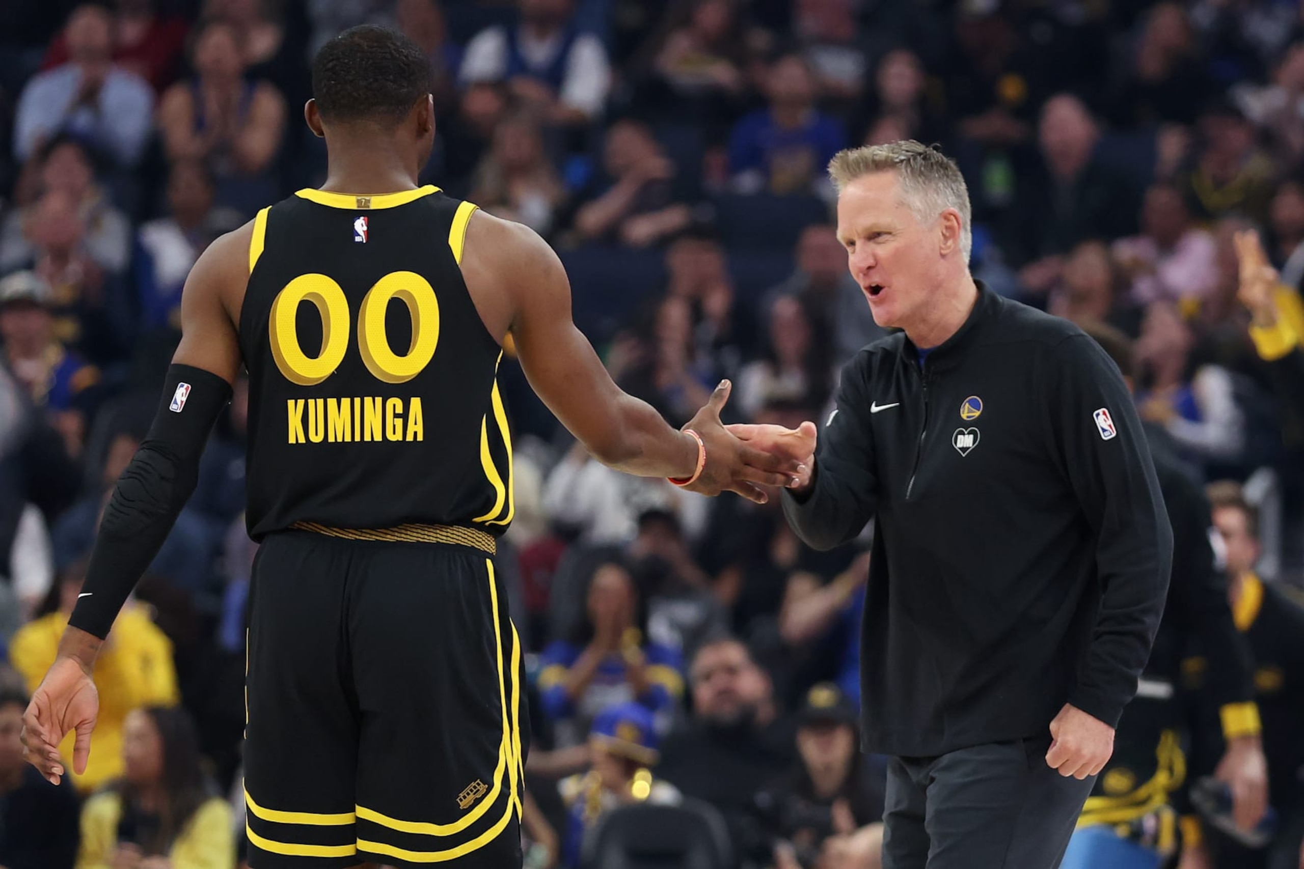 Jonathan Kuminga and Steve Kerr Jonathan Kuminga and Steve Kerr