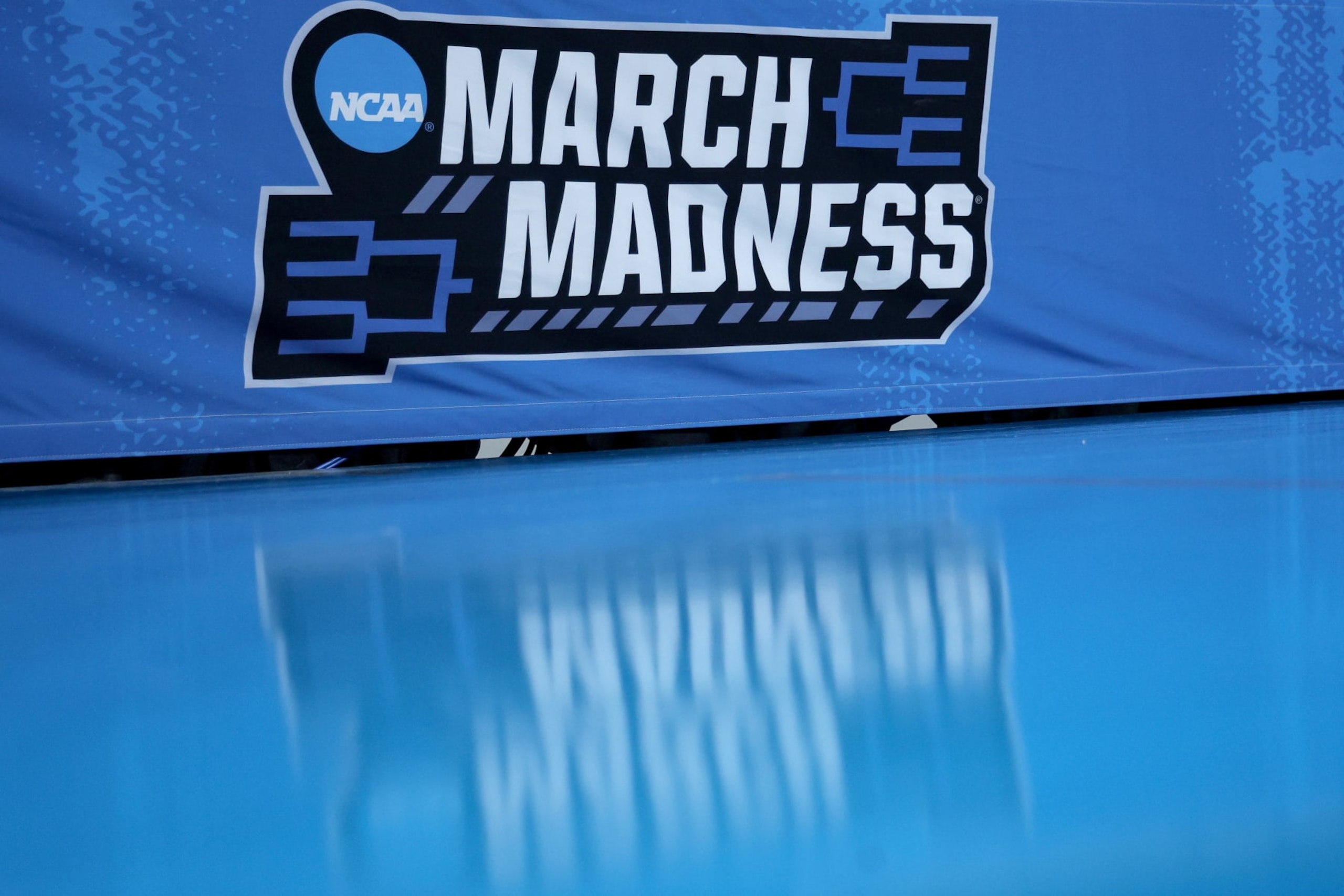 CHARLOTTE, NORTH CAROLINA - MARCH 21: A detail view of the March Madness logo is seen prior to the first round of the NCAA Men's Basketball Tournament at Spectrum Center on March 21, 2024 in Charlotte, North Carolina. (Photo by Jared C. Tilton/Getty Images)