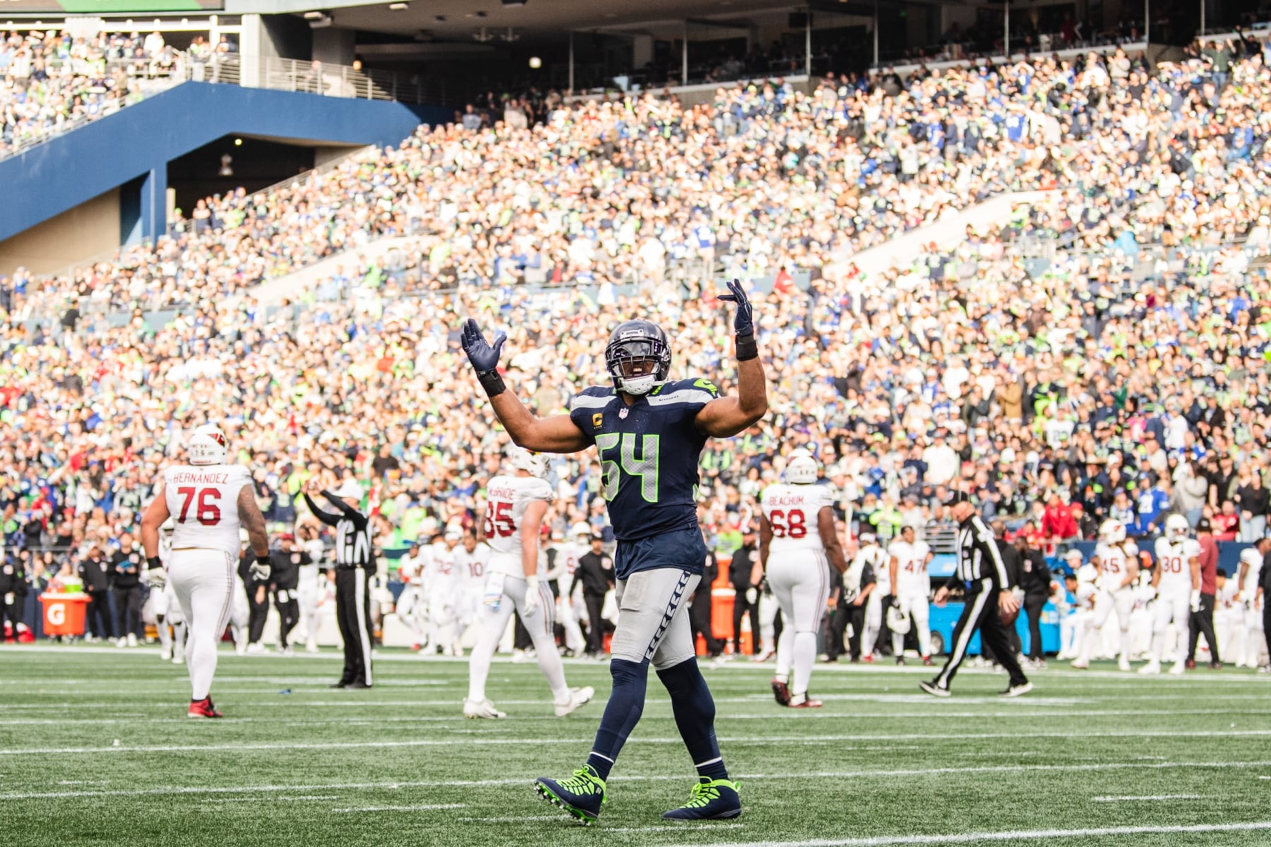 SEATTLE, WASHINGTON - OCTOBER 22: Bobby Wagner #54 of the Seattle Seahawks pumps up the crowd during the third quarter of the game against the Arizona Cardinals at Lumen Field on October 22, 2023 in Seattle, Washington. (Photo by Jane Gershovich/Getty Images) SEATTLE, WASHINGTON - OCTOBER 22: Bobby Wagner #54 of the Seattle Seahawks pumps up the crowd during the third quarter of the game against the Arizona Cardinals at Lumen Field on October 22, 2023 in Seattle, Washington. (Photo by Jane Gershovich/Getty Images)