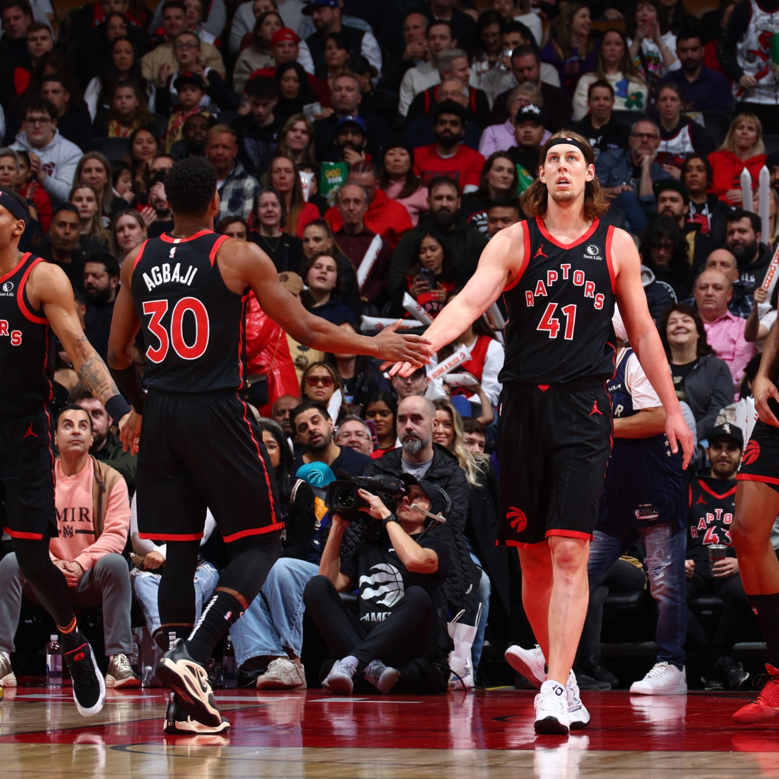Ochai Agbaji and Kelly Olynyk Ochai Agbaji and Kelly Olynyk