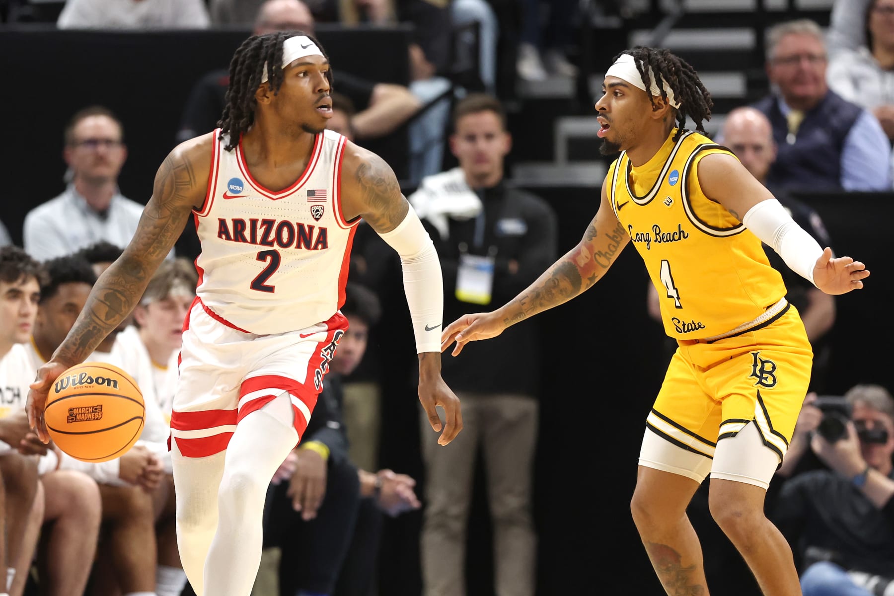 SALT LAKE CITY, UTAH - MARCH 21: Messiah Thompson #4 of the Long Beach State 49ers defends against Caleb Love #2 of the Arizona Wildcats during the first half in the first round of the NCAA Men's Basketball Tournament at Delta Center on March 21, 2024 in Salt Lake City, Utah. (Photo by Christian Petersen/Getty Images)