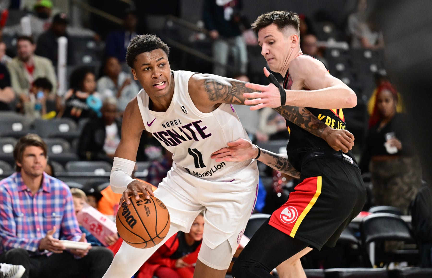 COLLEGE PARK, GA - MARCH 3rd: Tyler Smith #11 of the G-League Ignite handles the ball during the game against the College Park Skyhawks on March 3rd, 2024 at Gateway Center Arena in College Park, Georgia. NOTE TO USER: User expressly acknowledges and agrees that, by downloading and or using this photograph, user is consenting to the terms and conditions of Getty Images License Agreement. Mandatory Copyright Notice: Copyright 2024 NBAE (Photo by Adam Hagy/NBAE via Getty Images)