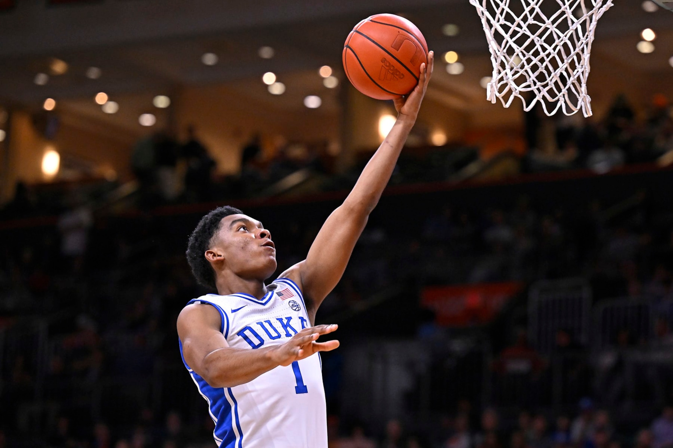 CORAL GABLES, FL - FEBRUARY 21: Duke guard Caleb Foster (1) puts up a basket in the second half as the Miami Hurricanes faced the Duke Blue Devils on February 21, 2024, at the Watsco Center in Coral Gables, Florida. (Photo by Samuel Lewis/Icon Sportswire via Getty Images) CORAL GABLES, FL - FEBRUARY 21: Duke guard Caleb Foster (1) puts up a basket in the second half as the Miami Hurricanes faced the Duke Blue Devils on February 21, 2024, at the Watsco Center in Coral Gables, Florida. (Photo by Samuel Lewis/Icon Sportswire via Getty Images)