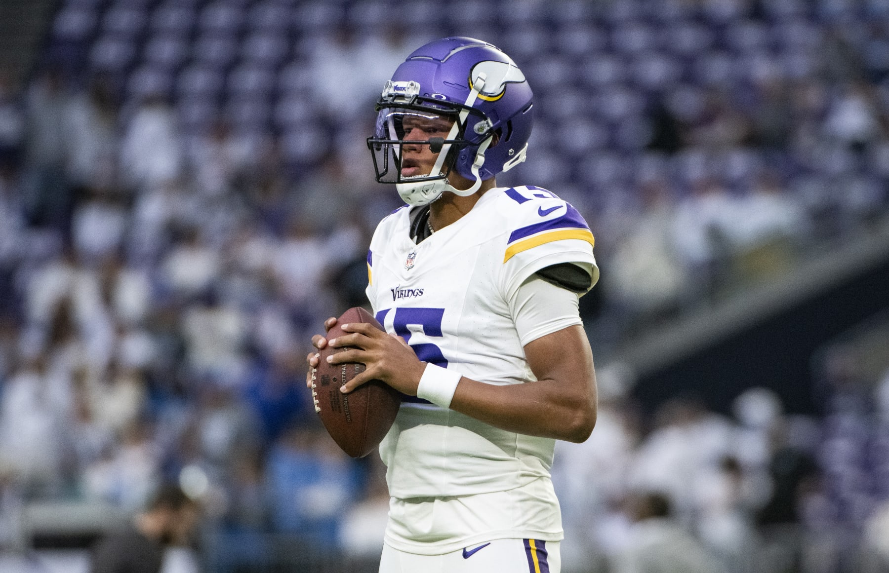 MINNEAPOLIS, MINNESOTA - DECEMBER 24: Joshua Dobbs #15 of the Minnesota Vikings warms up before the game against the Detroit Lions at U.S. Bank Stadium on December 24, 2023 in Minneapolis, Minnesota. (Photo by Stephen Maturen/Getty Images)