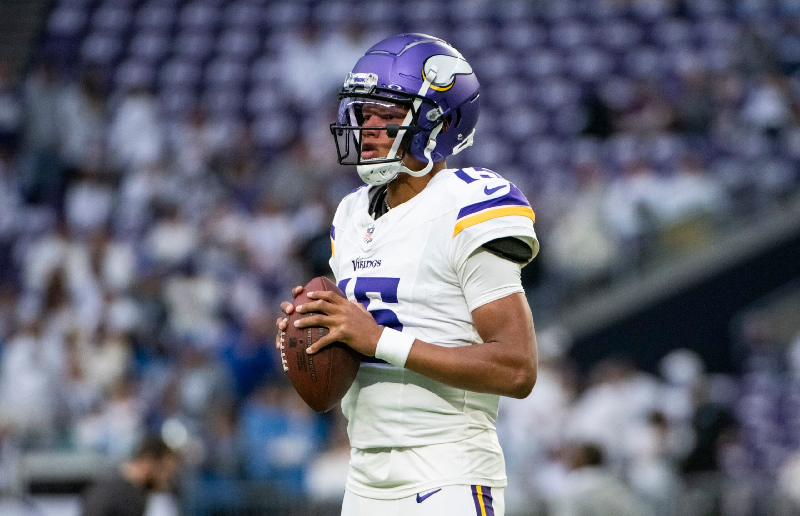 MINNEAPOLIS, MINNESOTA - DECEMBER 24: Joshua Dobbs #15 of the Minnesota Vikings warms up before the game against the Detroit Lions at U.S. Bank Stadium on December 24, 2023 in Minneapolis, Minnesota. (Photo by Stephen Maturen/Getty Images)
