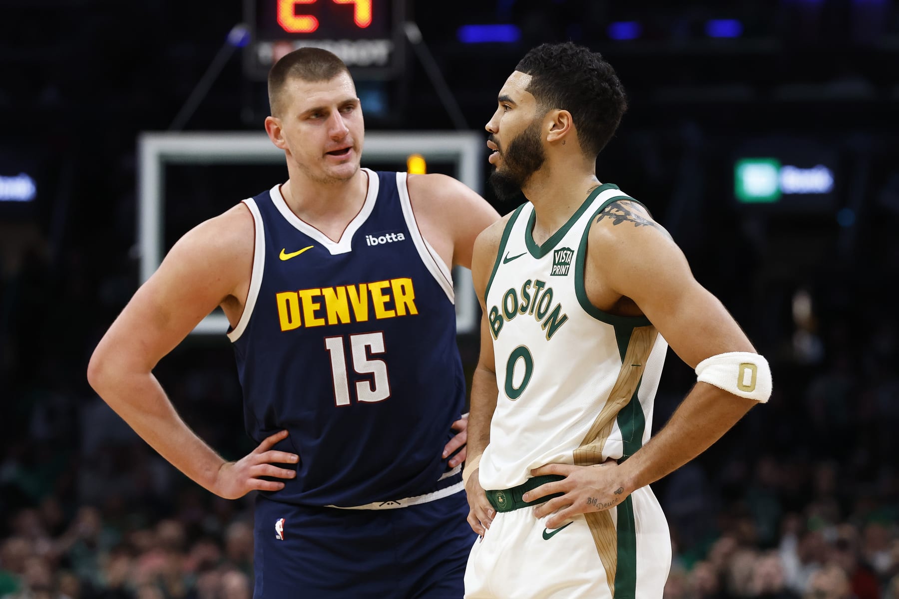 BOSTON, MA - JANUARY 19: Nikola Jokic #15 of the Denver Nuggets talks with Jayson Tatum #0 of the Boston Celtics during the second quarter at TD Garden on January 19, 2024 in Boston, Massachusetts. NOTE TO USER: User expressly acknowledges and agrees that, by downloading and/or using this Photograph, user is consenting to the terms and conditions of the Getty Images License Agreement. (Photo By Winslow Townson/Getty Images)