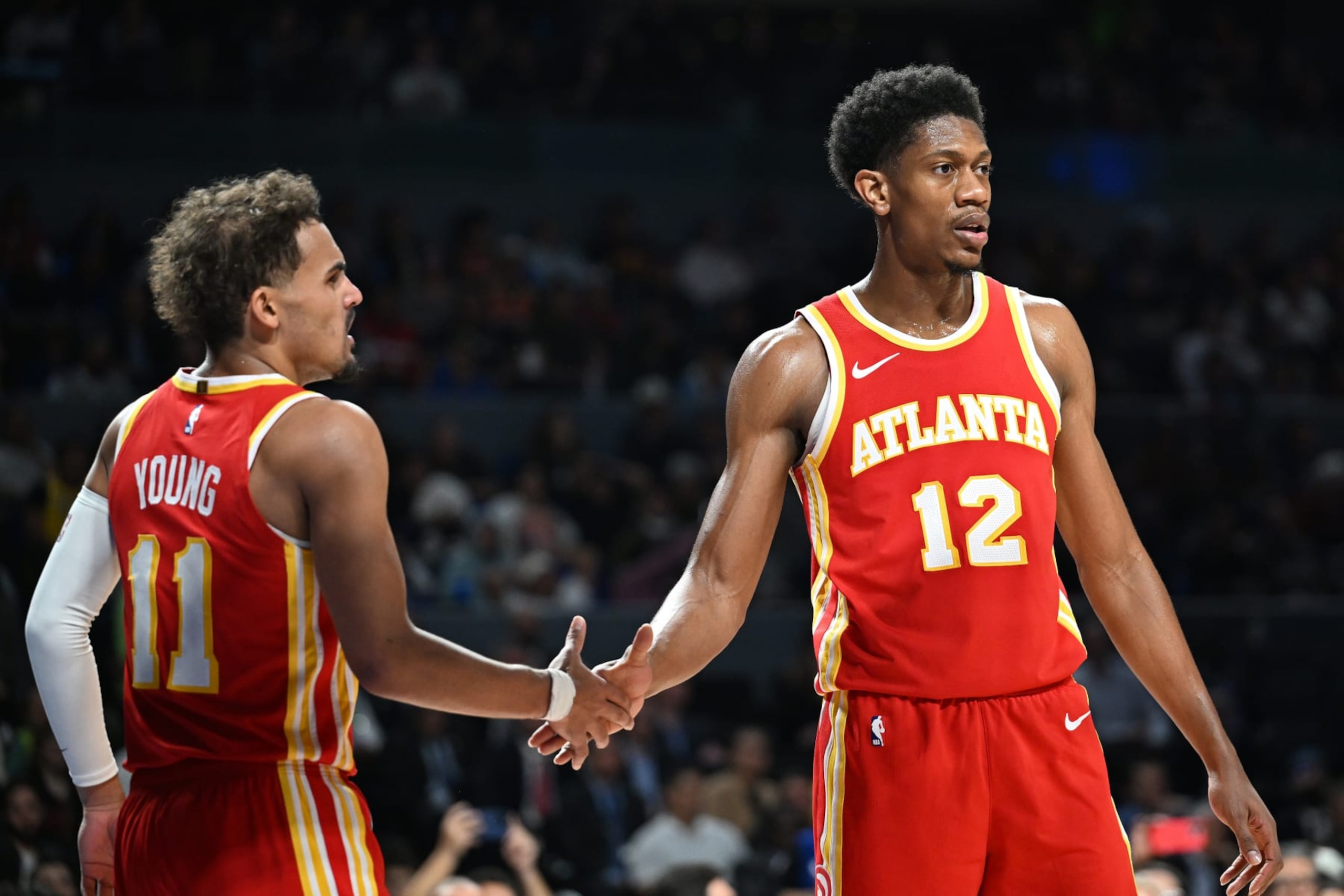 MEXICO CITY, MX - NOVEMBER 9: Trae Young #11 and De'Andre Hunter #12 of the Atlanta Hawks high five during the game against the Orlando Magic as part of 2023 NBA Mexico Games on November 9, 2023 at Arena Ciudad de Mexico in Mexico City, Mexico. NOTE TO USER: User expressly acknowledges and agrees that, by downloading and or using this photograph, User is consenting to the terms and conditions of the Getty Images License Agreement. Mandatory Copyright Notice: Copyright 2023 NBAE (Photo by Adam Hagy/NBAE via Getty Images) MEXICO CITY, MX - NOVEMBER 9: Trae Young #11 and De'Andre Hunter #12 of the Atlanta Hawks high five during the game against the Orlando Magic as part of 2023 NBA Mexico Games on November 9, 2023 at Arena Ciudad de Mexico in Mexico City, Mexico. NOTE TO USER: User expressly acknowledges and agrees that, by downloading and or using this photograph, User is consenting to the terms and conditions of the Getty Images License Agreement. Mandatory Copyright Notice: Copyright 2023 NBAE (Photo by Adam Hagy/NBAE via Getty Images)