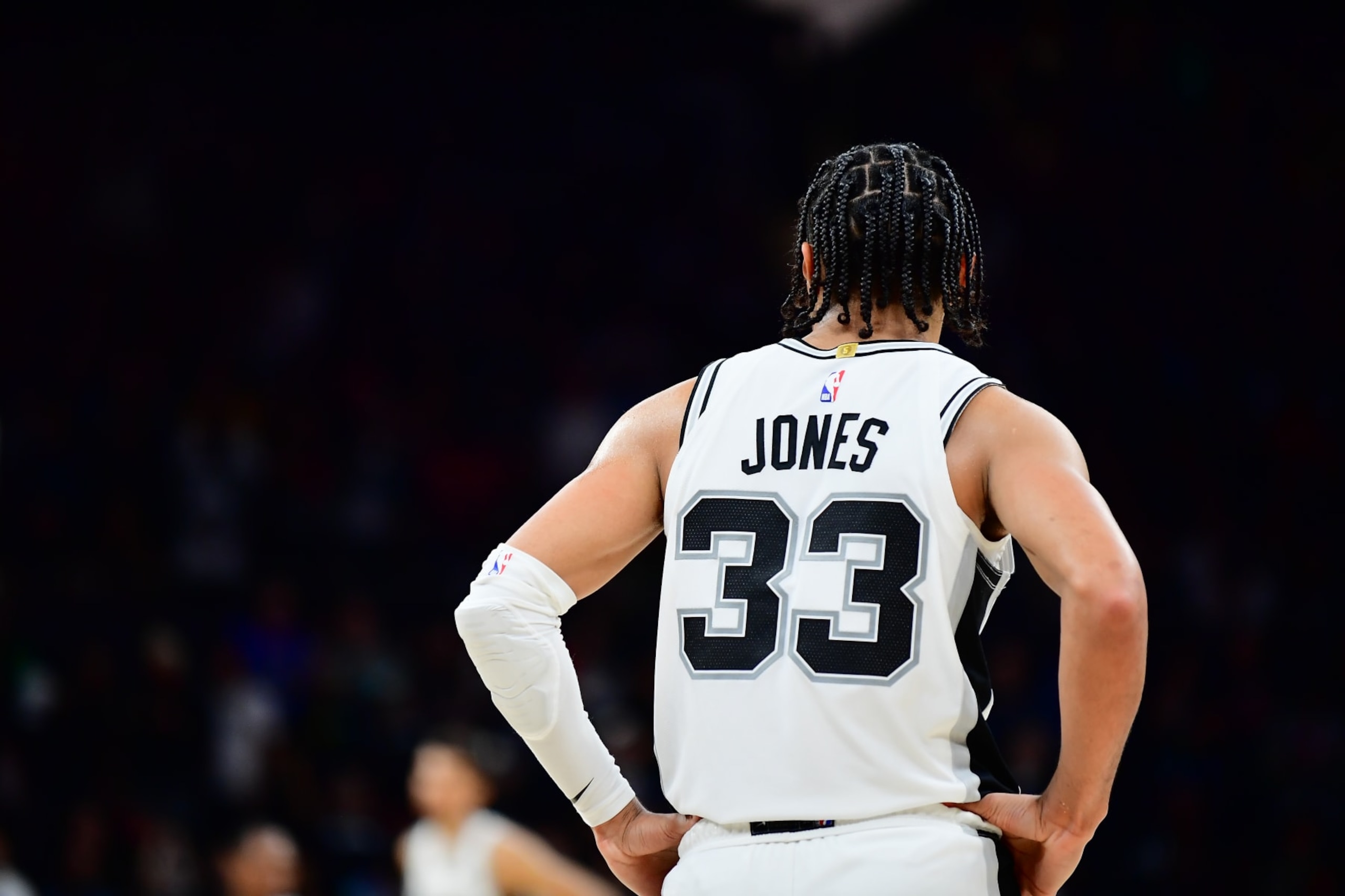 AUSTIN, TX - MARCH 15: Tre Jones #33 of the San Antonio Spurs looks on during the game against the Denver Nuggets on March 15, 2024 at the Moody Center in Austin, Texas. NOTE TO USER: User expressly acknowledges and agrees that, by downloading and or using this photograph, user is consenting to the terms and conditions of the Getty Images License Agreement. Mandatory Copyright Notice: Copyright 2024 NBAE (Photos by Michael Gonzales/NBAE via Getty Images) AUSTIN, TX - MARCH 15: Tre Jones #33 of the San Antonio Spurs looks on during the game against the Denver Nuggets on March 15, 2024 at the Moody Center in Austin, Texas. NOTE TO USER: User expressly acknowledges and agrees that, by downloading and or using this photograph, user is consenting to the terms and conditions of the Getty Images License Agreement. Mandatory Copyright Notice: Copyright 2024 NBAE (Photos by Michael Gonzales/NBAE via Getty Images)