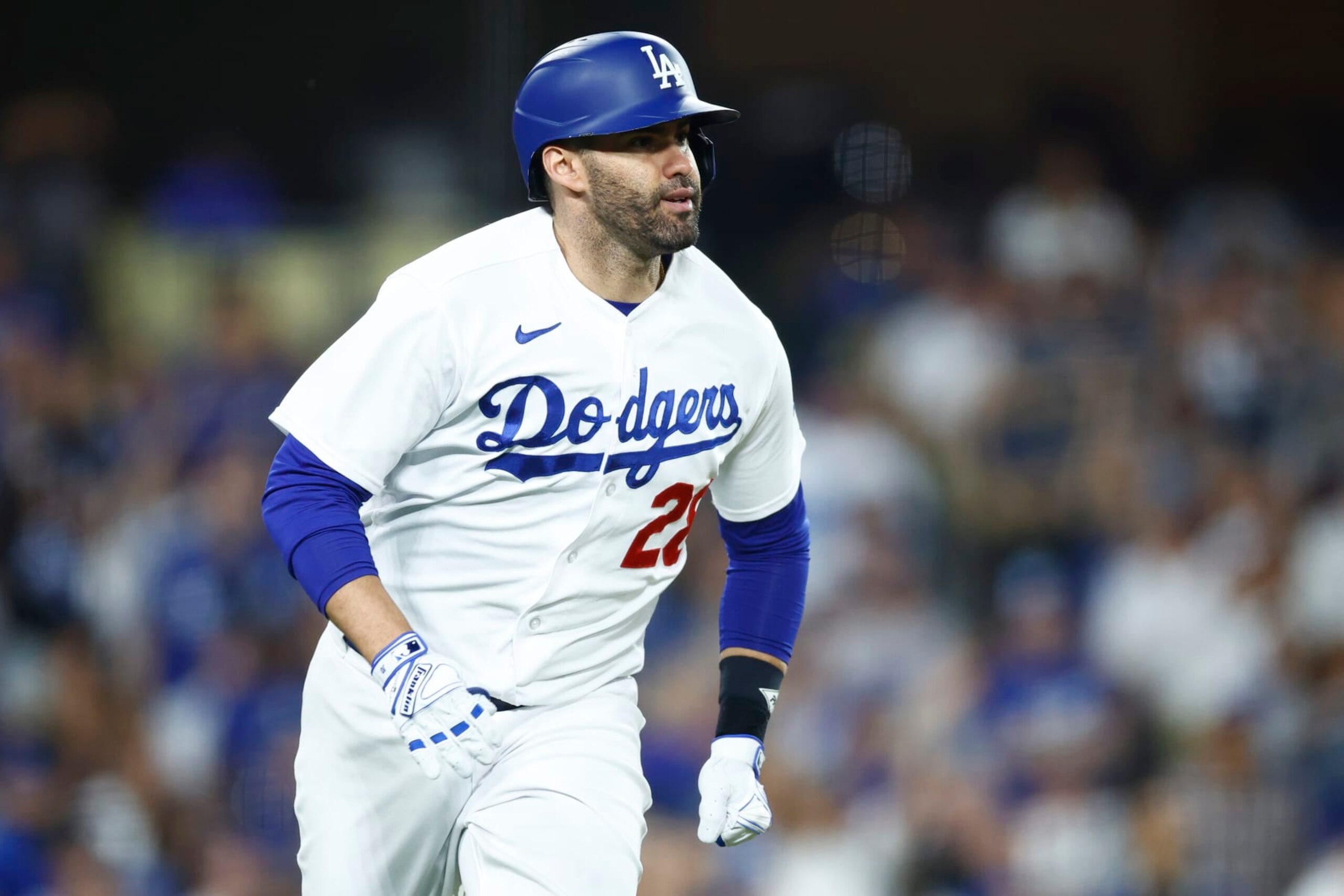 LOS ANGELES, CALIFORNIA - OCTOBER 09: J.D. Martinez #28 of the Los Angeles Dodgers hits a solo home run against the Arizona Diamondbacks during the fourth inning in Game Two of the Division Series at Dodger Stadium on October 09, 2023 in Los Angeles, California. (Photo by Ronald Martinez/Getty Images)