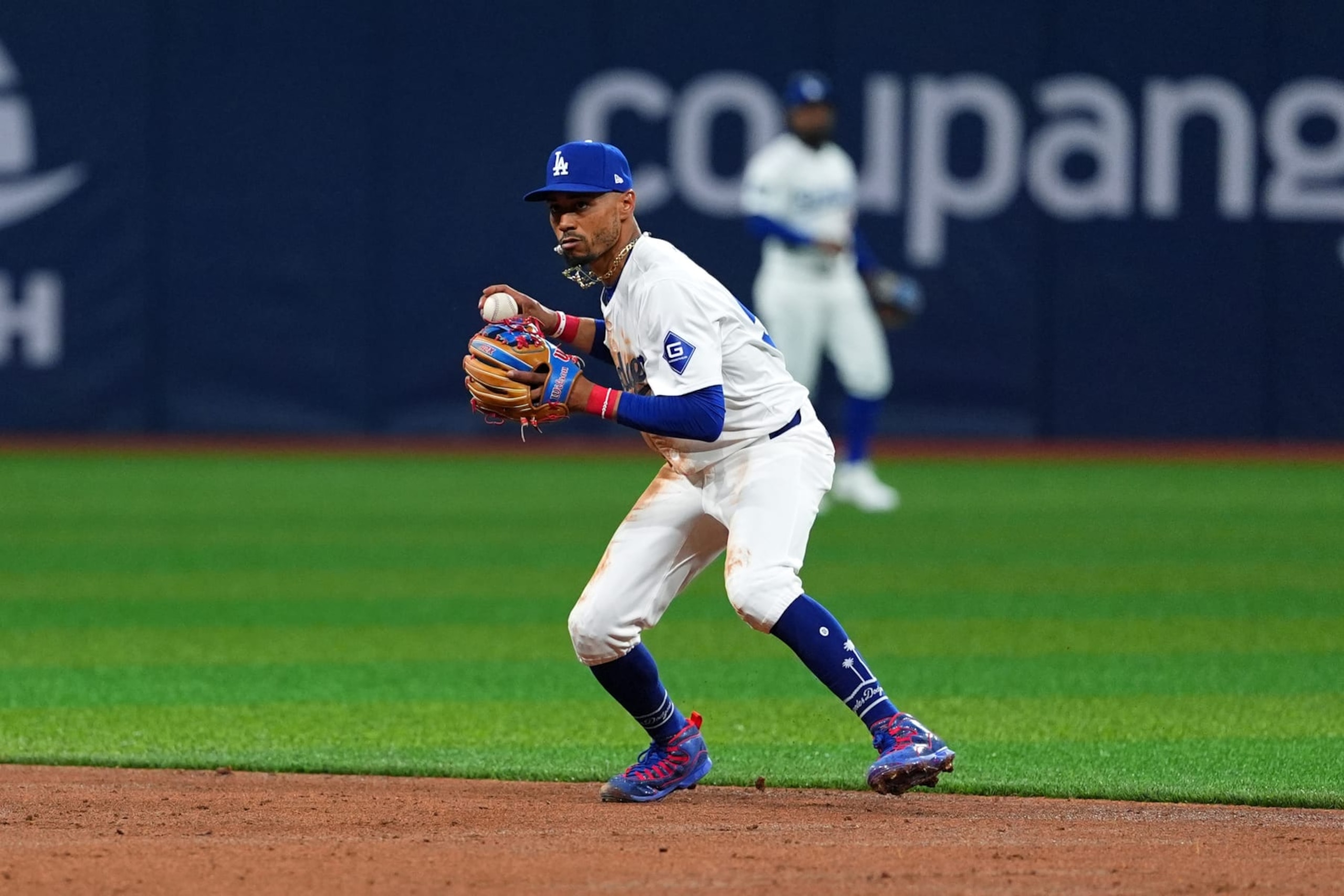 SEOUL, SOUTH KOREA - MARCH 18: Mookie Betts #50 of the Los Angeles Dodgers fields a grounder in the 2nd inning during the exhibition game between Team Korea and Los Angeles Dodgers at Gocheok Sky Dome on March 18, 2024 in Seoul, South Korea. (Photo by Masterpress/Getty Images)