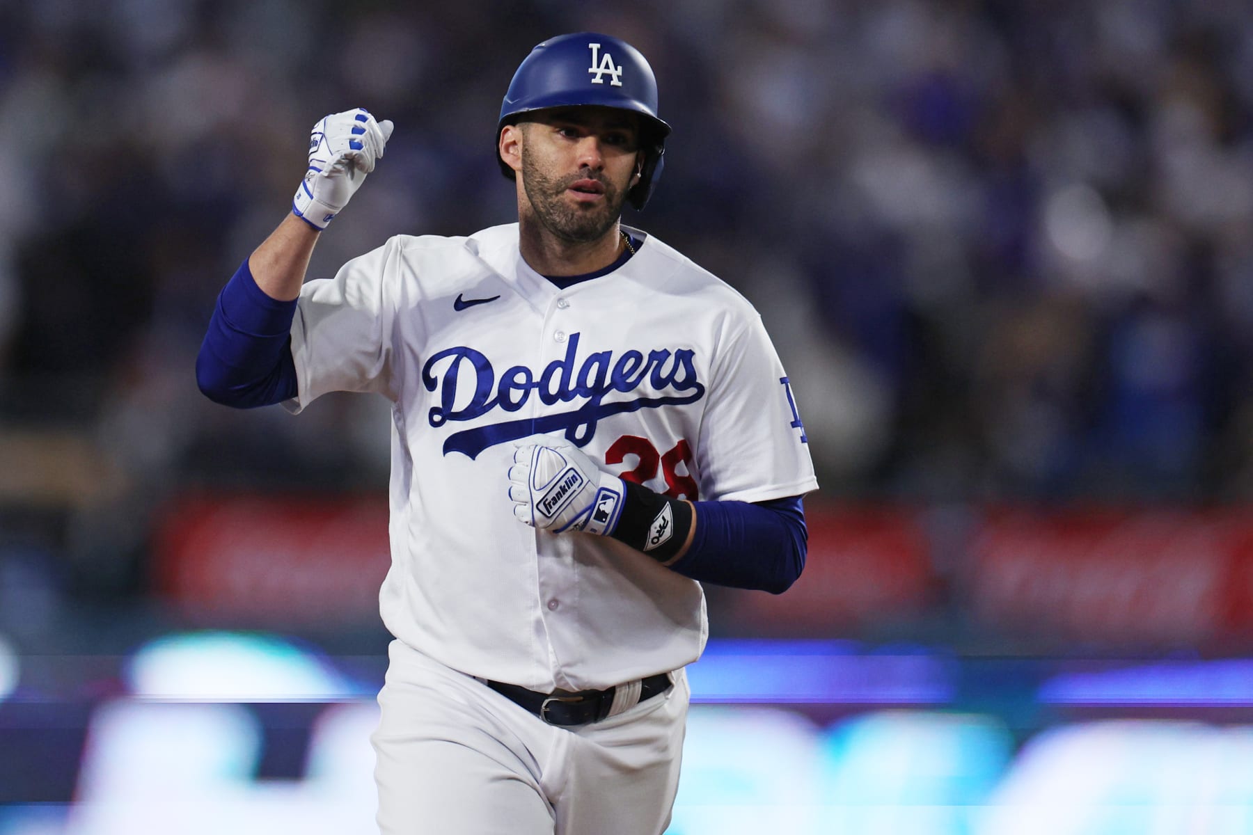 LOS ANGELES, CALIFORNIA - OCTOBER 09: J.D. Martinez #28 of the Los Angeles Dodgers celebrates his solo home run against the Arizona Diamondbacks during the fourth inning in Game Two of the Division Series at Dodger Stadium on October 09, 2023 in Los Angeles, California. (Photo by Harry How/Getty Images)