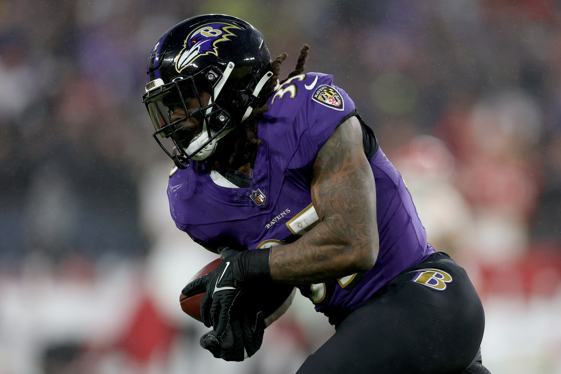 BALTIMORE, MARYLAND - JANUARY 28: Gus Edwards #35 of the Baltimore Ravens runs with the ball against the Kansas City Chiefs during the third quarter in the AFC Championship Game at M&T Bank Stadium on January 28, 2024 in Baltimore, Maryland. (Photo by Patrick Smith/Getty Images)