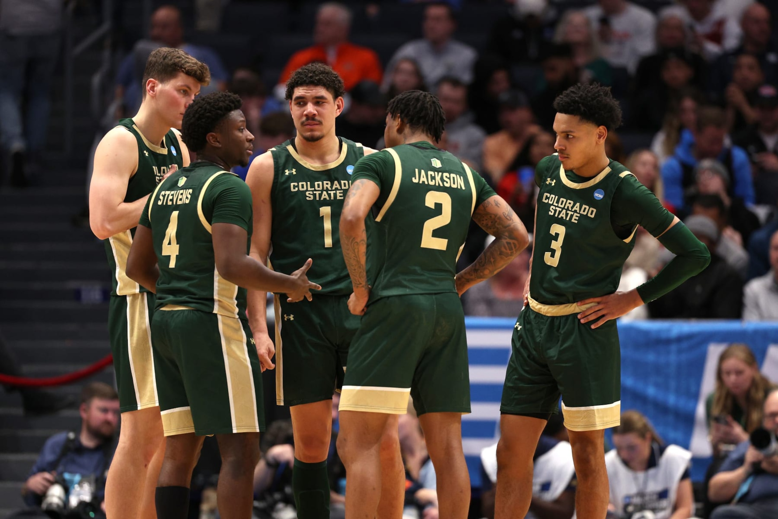 DAYTON, OHIO - MARCH 19: Isaiah Stevens #4 of the Colorado State Rams talks with teammates during the first half against the Virginia Cavaliers in the First Four game during the NCAA Men's Basketball Tournament at University of Dayton Arena on March 19, 2024 in Dayton, Ohio. (Photo by Michael Hickey/Getty Images)