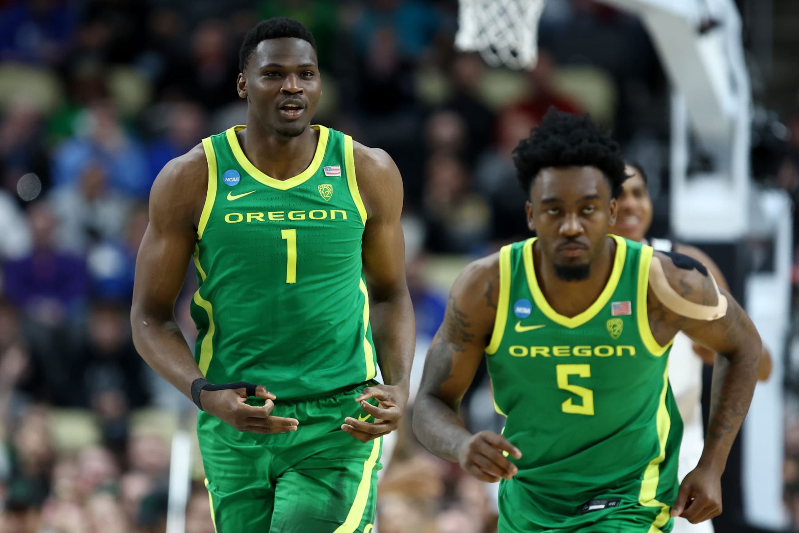 Oregon's N'Faly Dante and Jermaine Couisnard