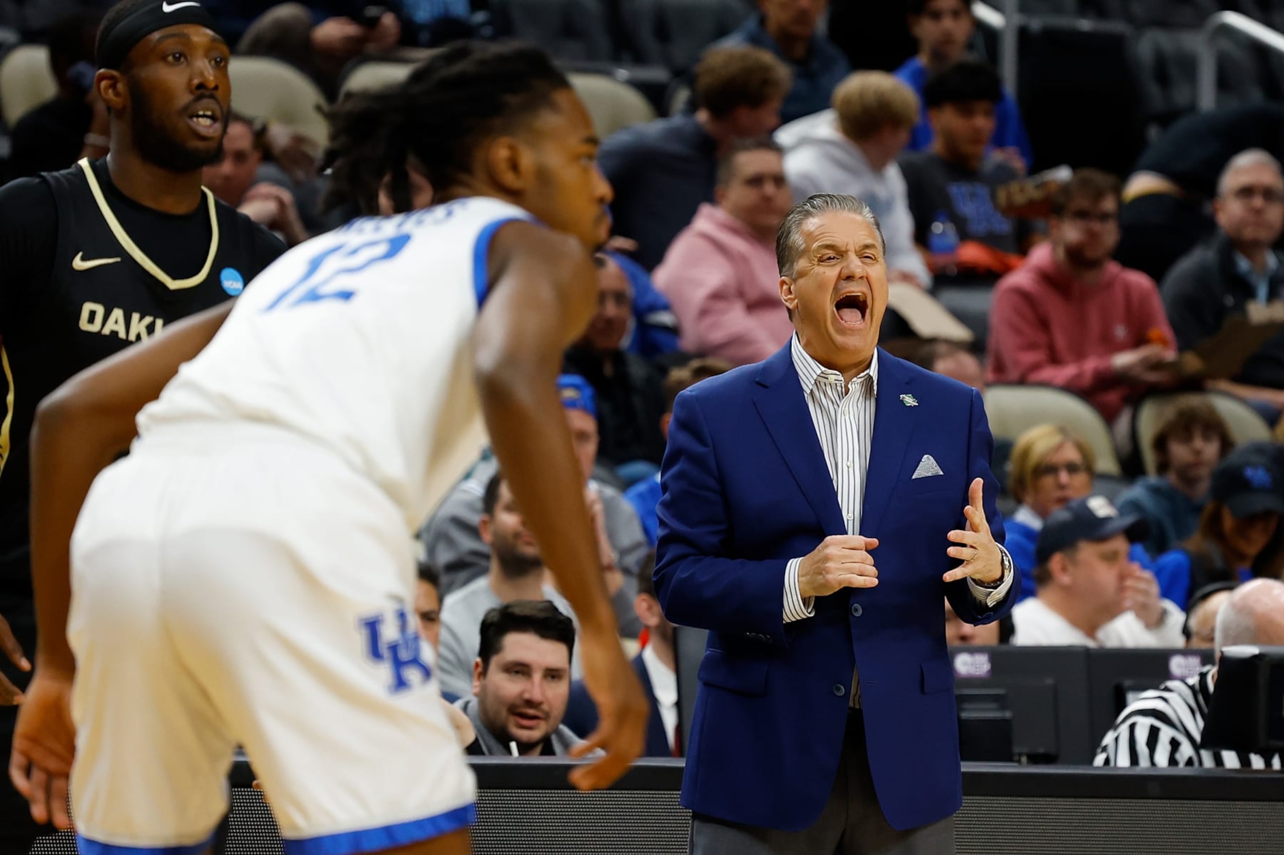 PITTSBURGH, PENNSYLVANIA - MARCH 21: head coach John Calipari of the Kentucky Wildcats yells in the first half of the game against the Oakland Golden Grizzlies during the first round of the 2024 NCAA Men's Basketball Tournament held at PPG PAINTS Arena on March 21, 2024 in Pittsburgh, Pennsylvania. (Photo by Justin K. Aller/NCAA Photos via Getty Images)