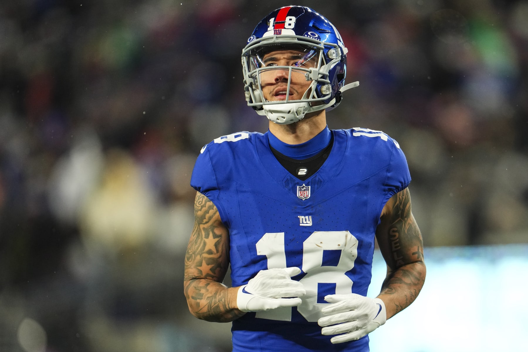 EAST RUTHERFORD, NJ - JANUARY 07: Isaiah Hodgins #18 of the New York Giants looks on from the field during an NFL football game against the Philadelphia Eagles at MetLife Stadium on January 7, 2024 in East Rutherford, New Jersey. (Photo by Cooper Neill/Getty Images) EAST RUTHERFORD, NJ - JANUARY 07: Isaiah Hodgins #18 of the New York Giants looks on from the field during an NFL football game against the Philadelphia Eagles at MetLife Stadium on January 7, 2024 in East Rutherford, New Jersey. (Photo by Cooper Neill/Getty Images)