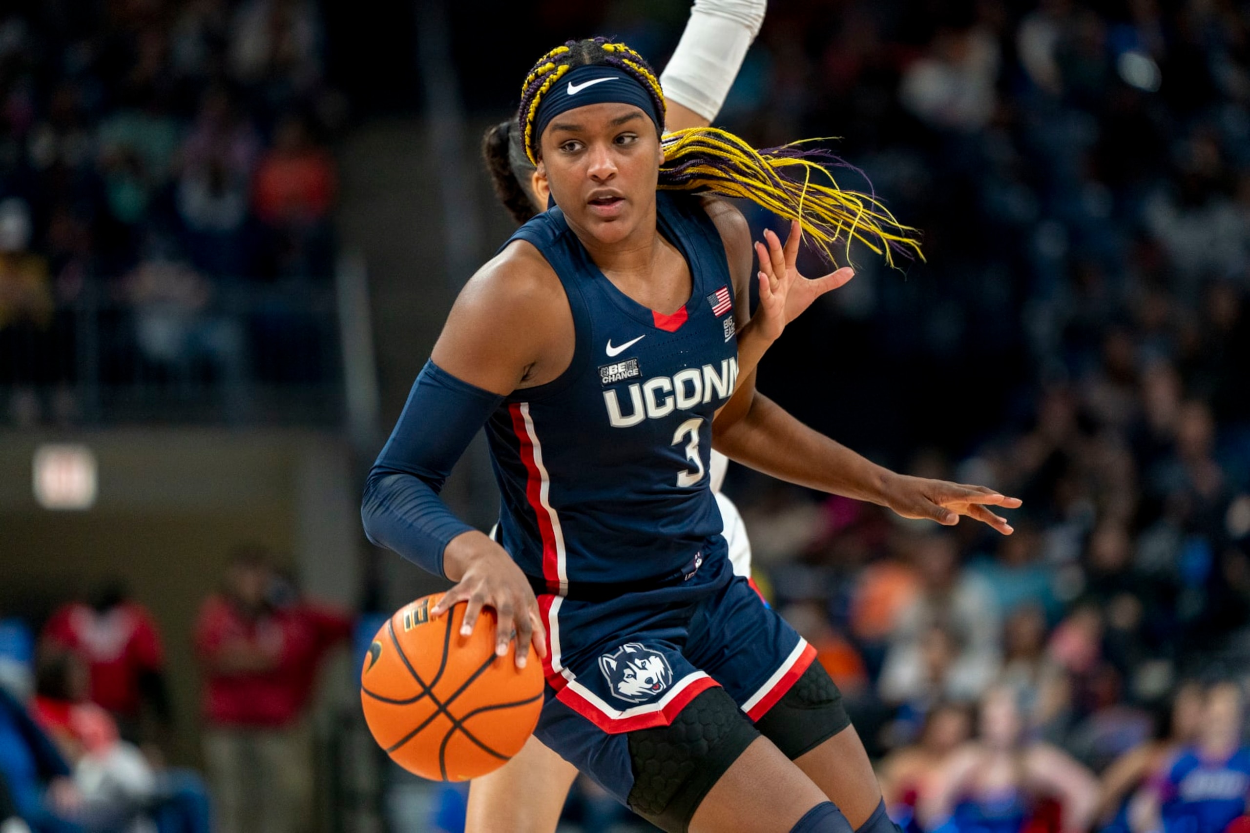 CHICAGO, IL - FEBRUARY 25: UConn Huskies forward Aaliyah Edwards (3) dribbles past a DePaul Blue Demons player during the women's college basketball game between the UConn Huskies and the Depaul Blue Demons on February 25, 2024, at Wintrust Arena in Chicago, IL. (Photo by Ben Hsu/Icon Sportswire via Getty Images)