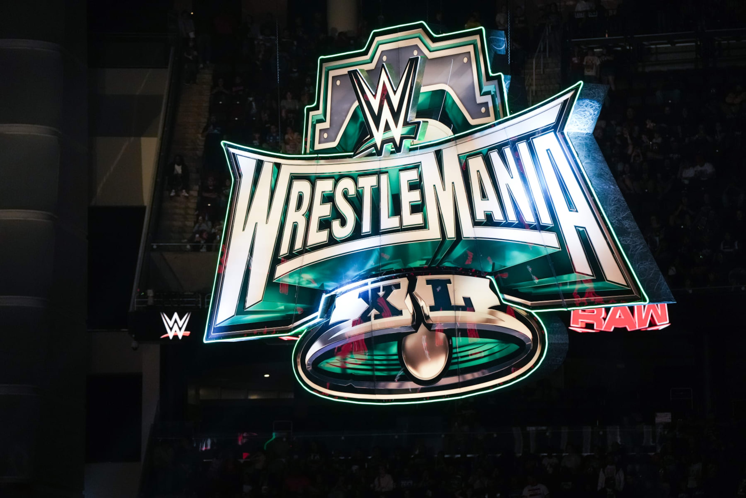HOUSTON, TEXAS - MARCH 11: A Wrestlemania sign is seen in the rafters during WWE Monday Night RAW at Toyota Center on March 11, 2024 in Houston, Texas. (Photo by Alex Bierens de Haan/Getty Images) HOUSTON, TEXAS - MARCH 11: A Wrestlemania sign is seen in the rafters during WWE Monday Night RAW at Toyota Center on March 11, 2024 in Houston, Texas. (Photo by Alex Bierens de Haan/Getty Images)