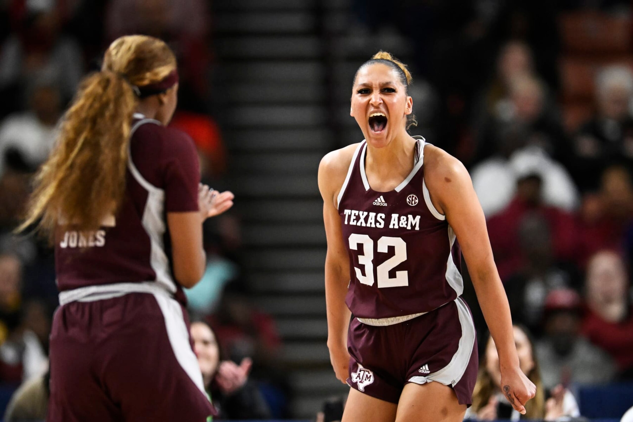 GREENVILLE, SOUTH CAROLINA - MARCH 08: Lauren Ware #32 of the Texas A&M Aggies celebrates her basket and foul against the South Carolina Gamecocks in the third quarter during the quarterfinals of the SEC Women's Basketball Tournament at Bon Secours Wellness Arena on March 08, 2024 in Greenville, South Carolina. (Photo by Eakin Howard/Getty Images)