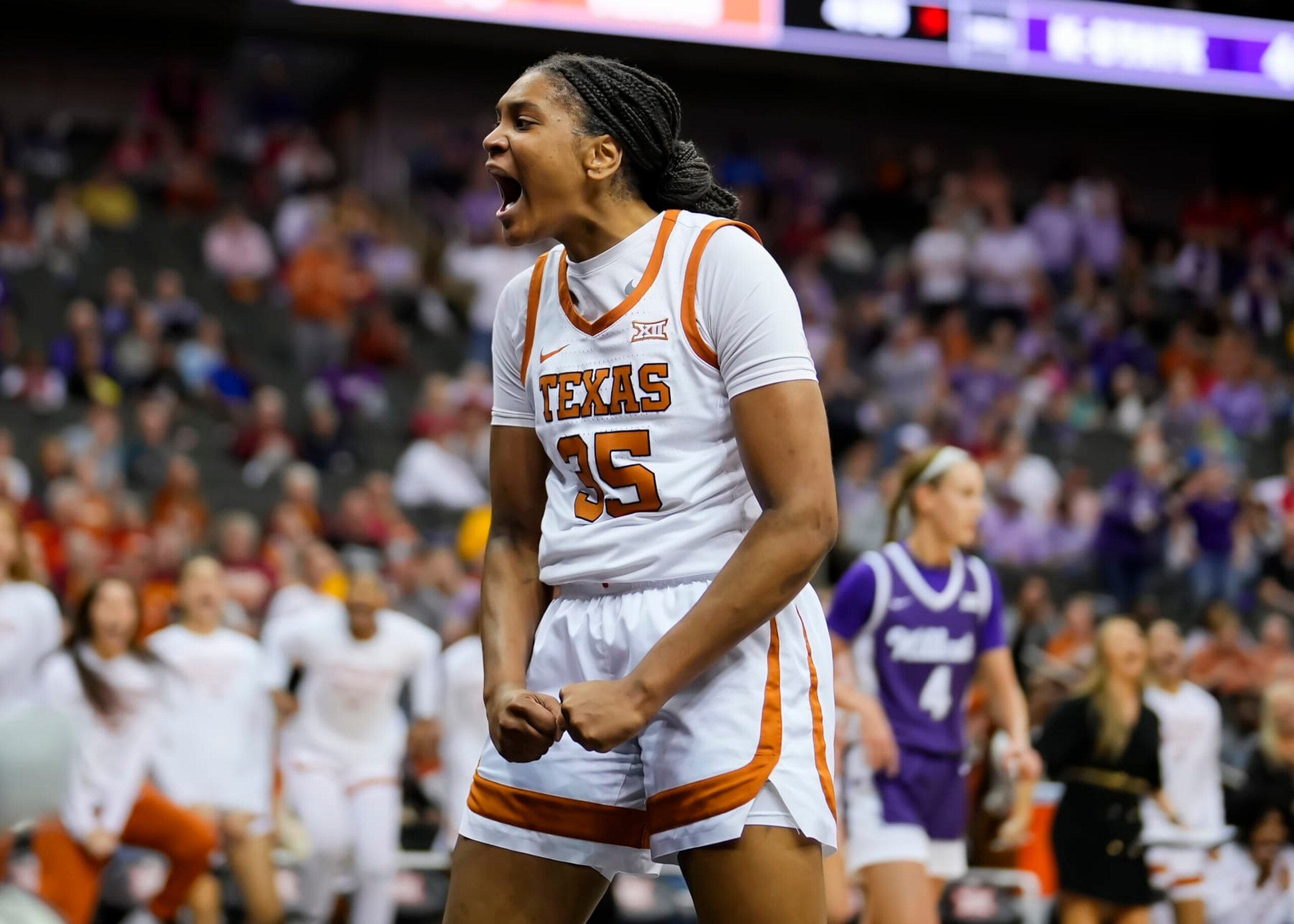 KANSAS CITY, MISSOURI - MARCH 11: Madison Booker #35 of the Texas Longhorns celebrates after scoring against the Kansas State Wildcats during the second half of the Big 12 Women's Basketball Tournament at T-Mobile Center on March 11, 2024 in Kansas City, Missouri. (Photo by Jay Biggerstaff/Getty Images)
