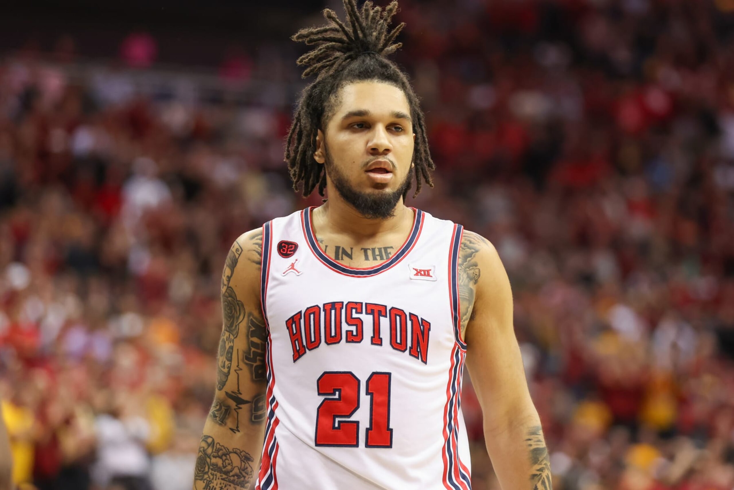 KANSAS CITY, MO - MARCH 16: Houston Cougars guard Emanuel Sharp (21) in the first half of the Big 12 tournament final between the Iowa State Cyclones and Houston Cougars on Mar 16, 2024 at T-Mobile Center in Kansas City, MO. (Photo by Scott Winters/Icon Sportswire via Getty Images)