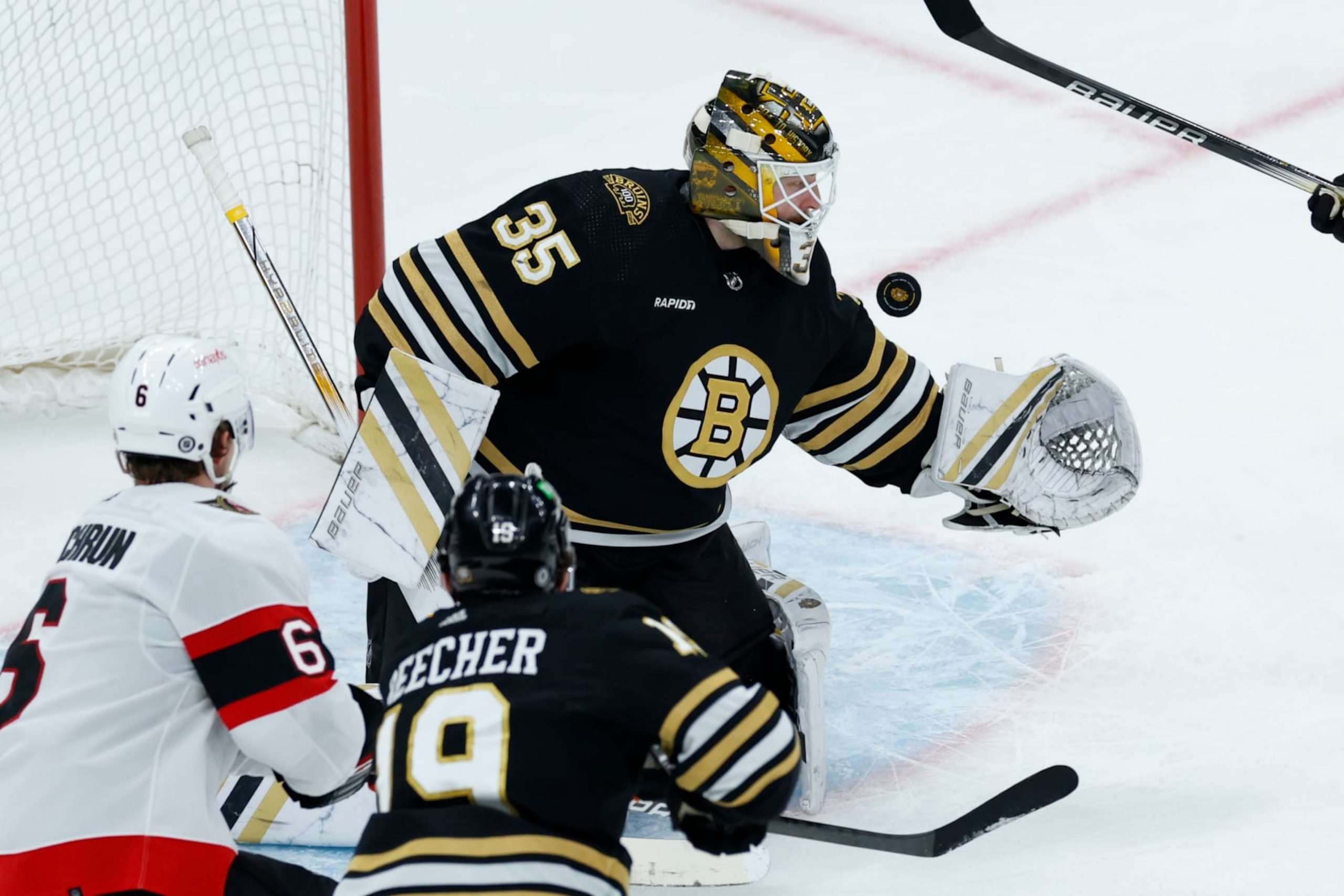 Boston, MA - March 19: Boston Bruins goaltender Linus Ullmark makes a save in the third period. The Bruins beat the Ottawa Senators, 6-2. (Photo by Danielle Parhizkaran/The Boston Globe via Getty Images) Boston, MA - March 19: Boston Bruins goaltender Linus Ullmark makes a save in the third period. The Bruins beat the Ottawa Senators, 6-2. (Photo by Danielle Parhizkaran/The Boston Globe via Getty Images)