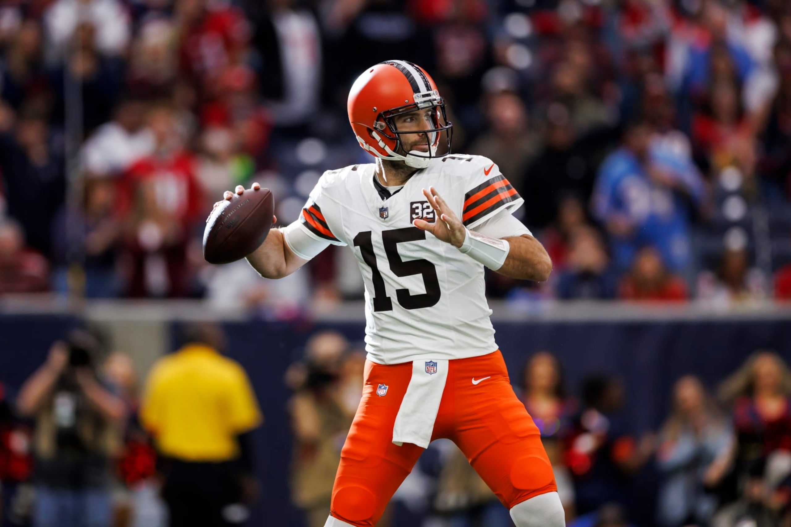 HOUSTON, TEXAS - JANUARY 13: Joe Flacco #15 of the Cleveland Browns drops back and looks to throw a pass during an AFC wild-card playoff football game against the Houston Texans at NRG Stadium on January 13, 2024 in Houston, Texas. (Photo by Ryan Kang/Getty Images)
