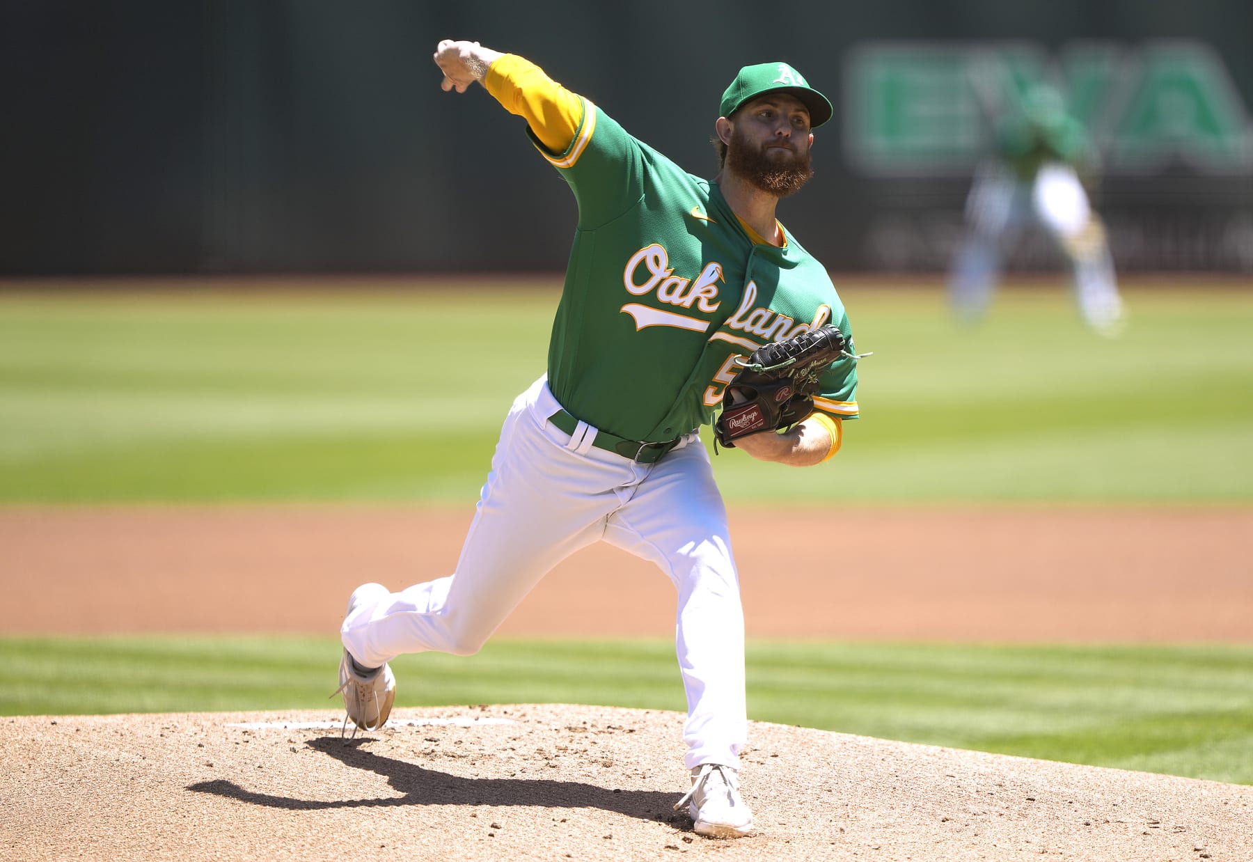 OAKLAND, CALIFORNIA - JULY 24: Paul Blackburn #58 of the Oakland Athletics pitches against the Texas Rangers in the top of the first inning at RingCentral Coliseum on July 24, 2022 in Oakland, California. (Photo by Thearon W. Henderson/Getty Images)