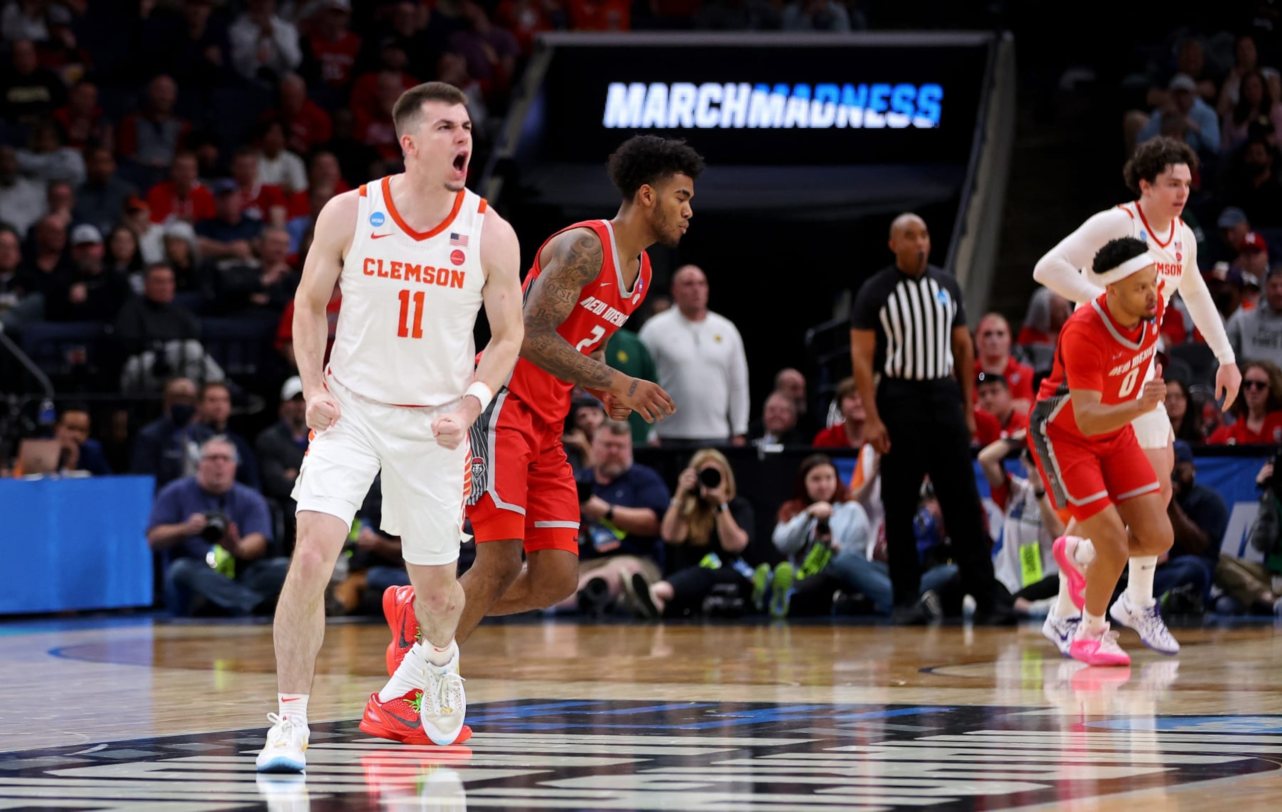 MEMPHIS, TENNESSEE - MARCH 22: Joseph Girard III #11 of the Clemson Tigers reacts to a play during a game against the New Mexico Lobos in the first round of the NCAA Men's Basketball Tournament  at FedExForum on March 22, 2024 in Memphis, Tennessee. (Photo by Stacy Revere/Getty Images)