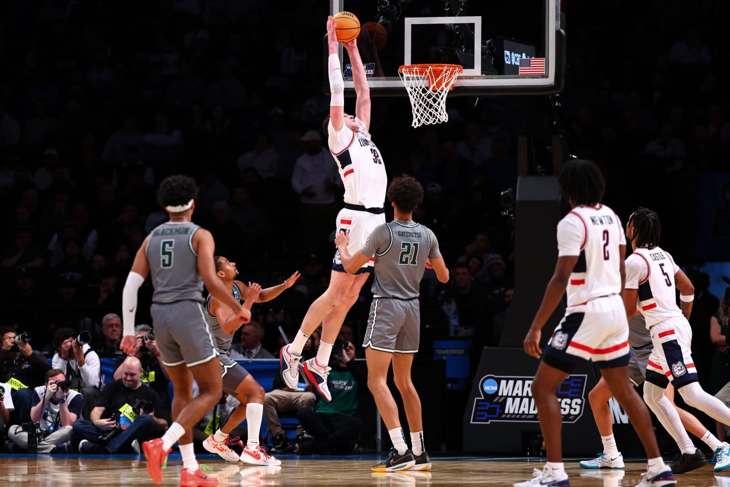 NEW YORK, NEW YORK - MARCH 22: Donovan Clingan #32 of the Connecticut Huskies dunks the ball during the first half of the game against the Stetson Hatters during the first round of the NCAA Men’s Basketball Tournament at Barclays Center on March 22, 2024 in New York City. (Photo by Jamie Schwaberow/NCAA Photos via Getty Images)